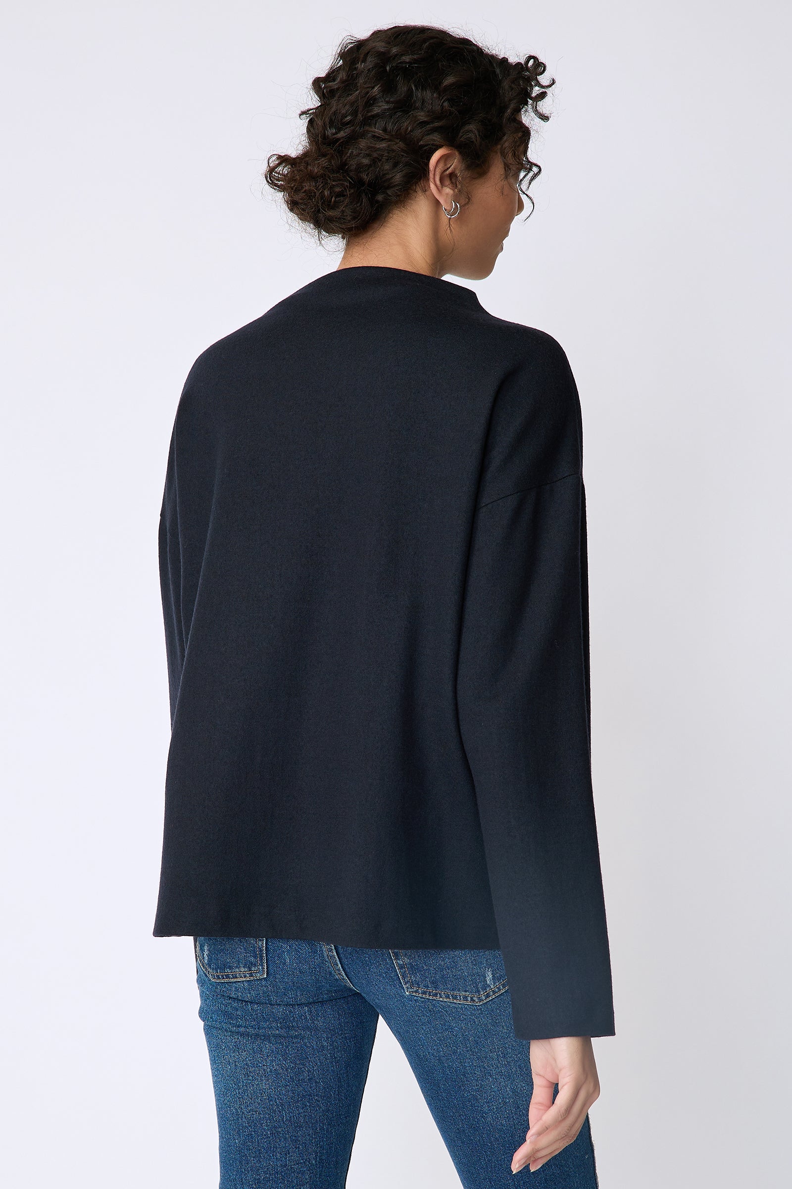 Kal Rieman Ethel mock funnelneck in midnight felted jersey on model back view