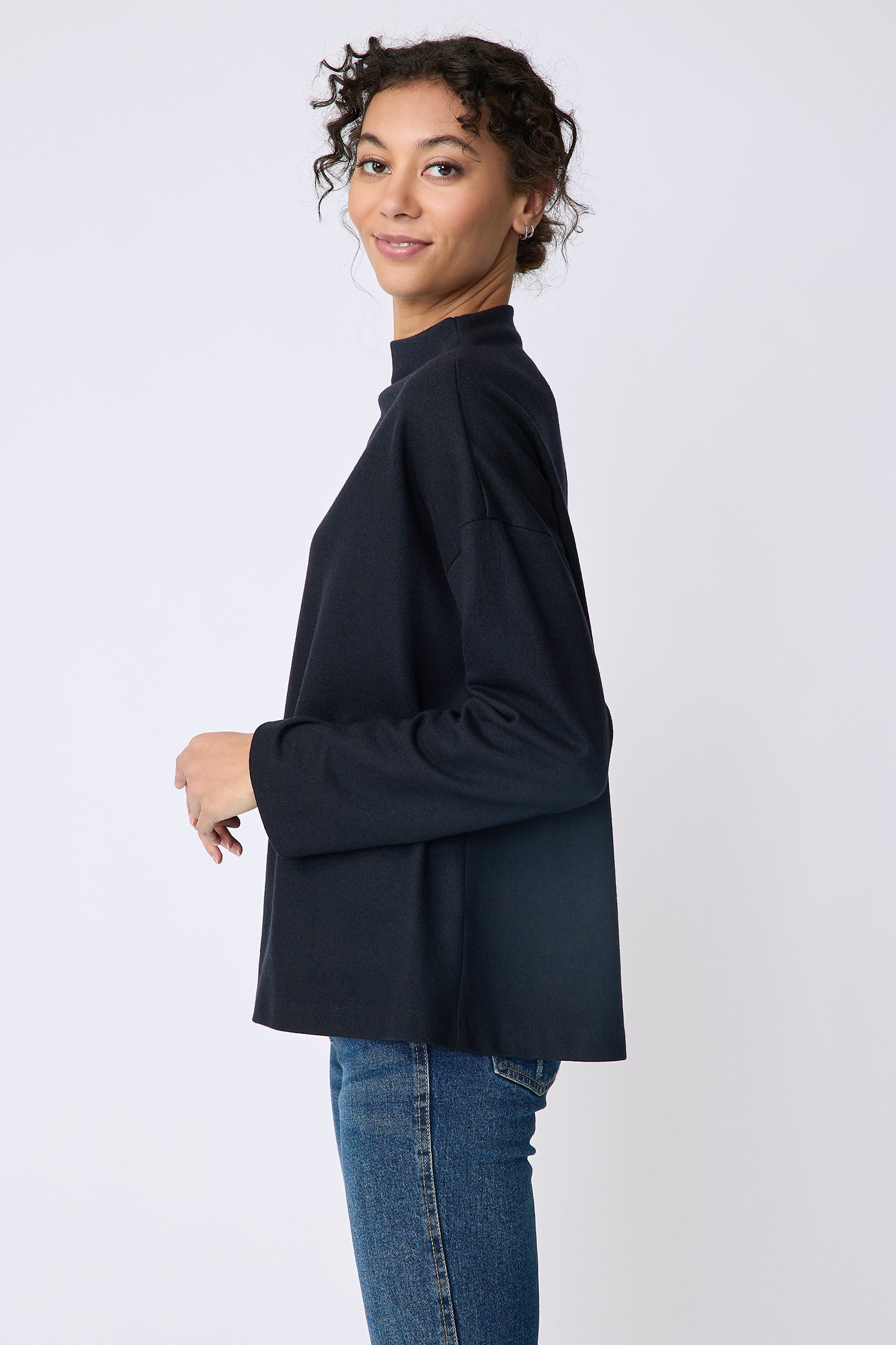 Kal Rieman Ethel mock funnelneck in midnight felted jersey on model side view
