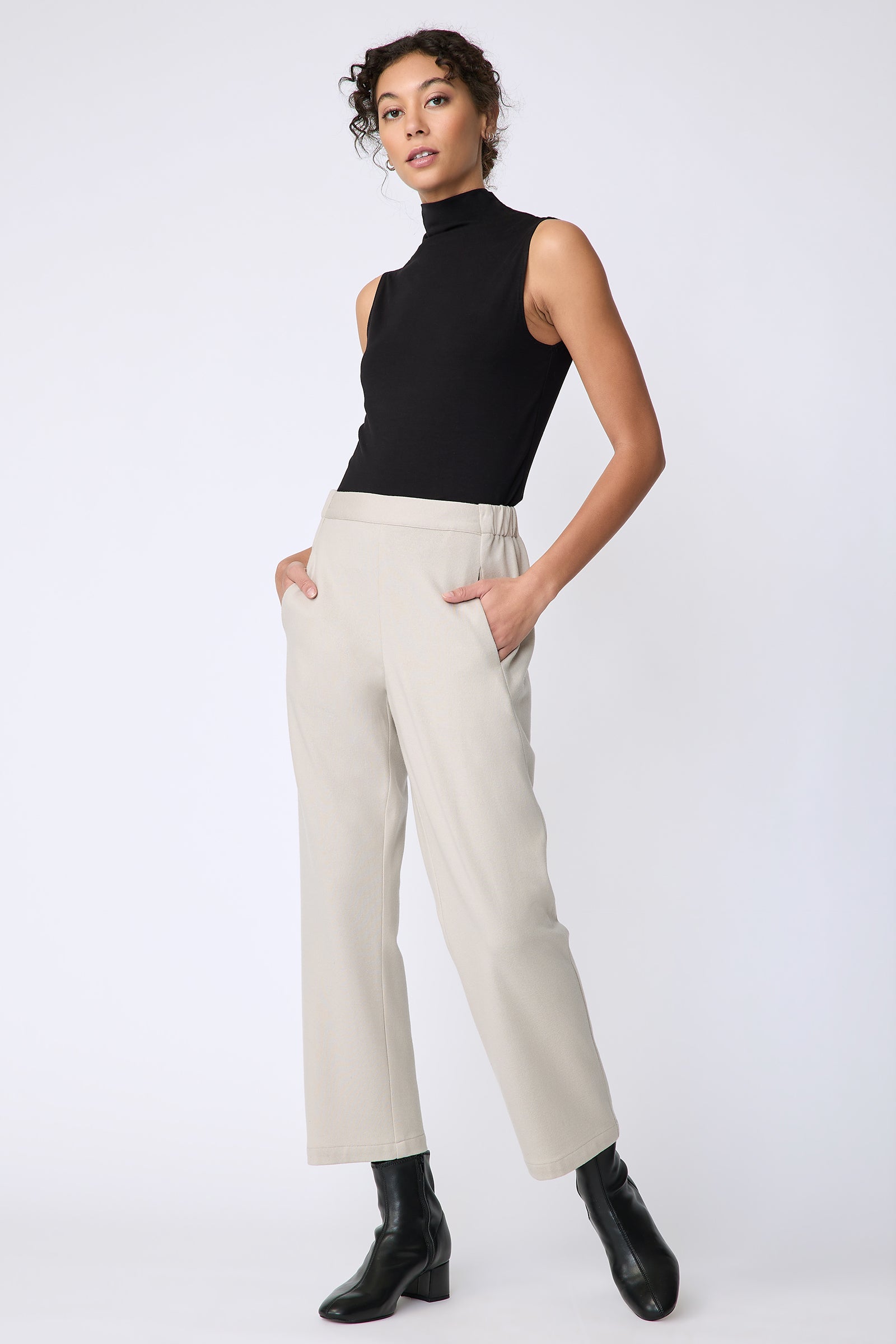 Kal Rieman Felted Jersey Angle seam crop pant in mink on model front view hands in pockets