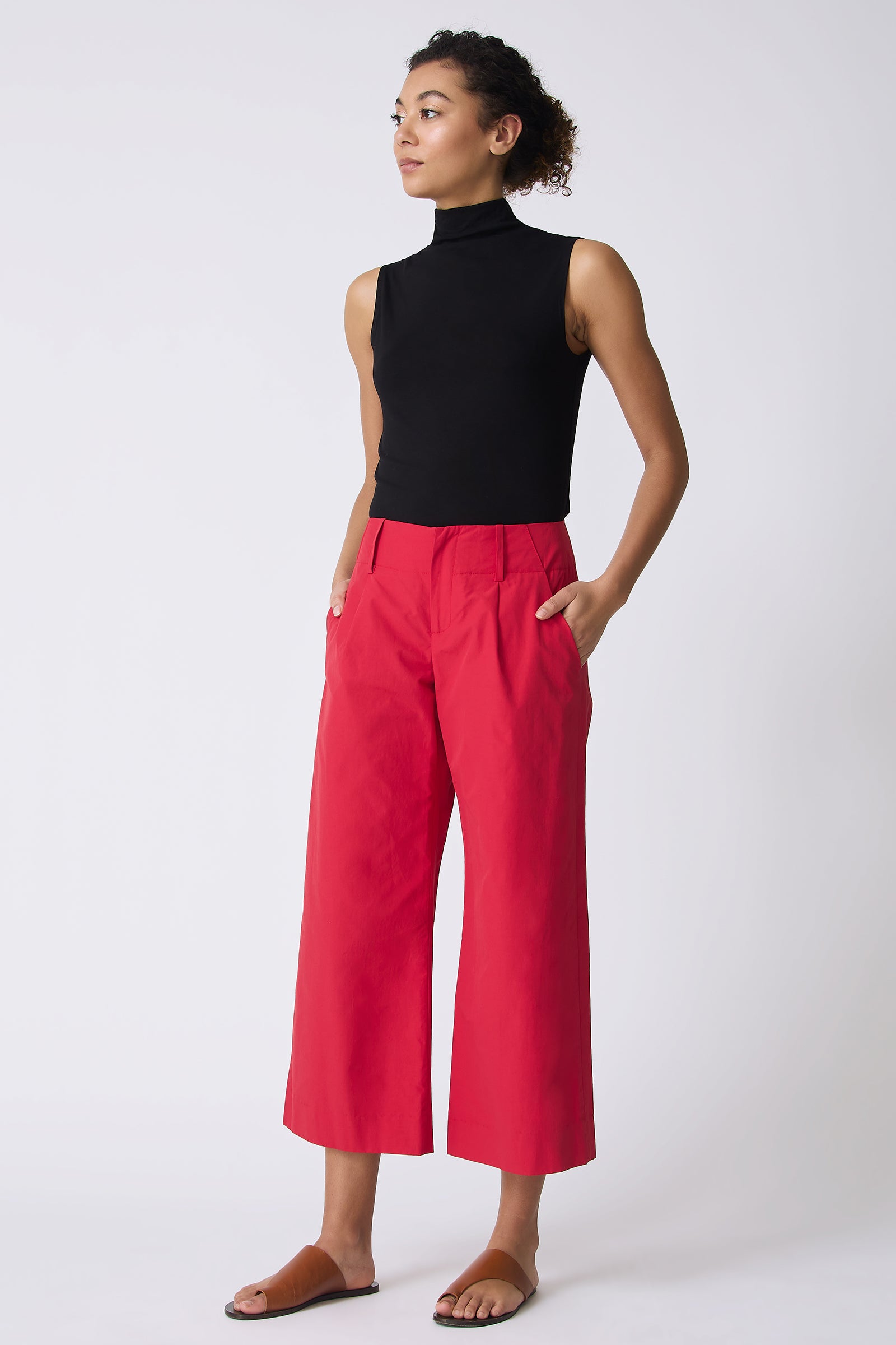 Kal Rieman Gabby Crop Pant in Red on model with hands in pockets full front view