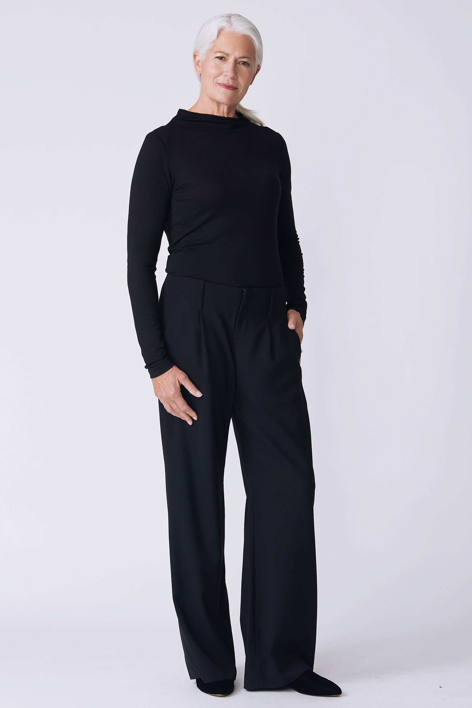 Kal Rieman Gabby Trouser in black on model side view hand in pocket
