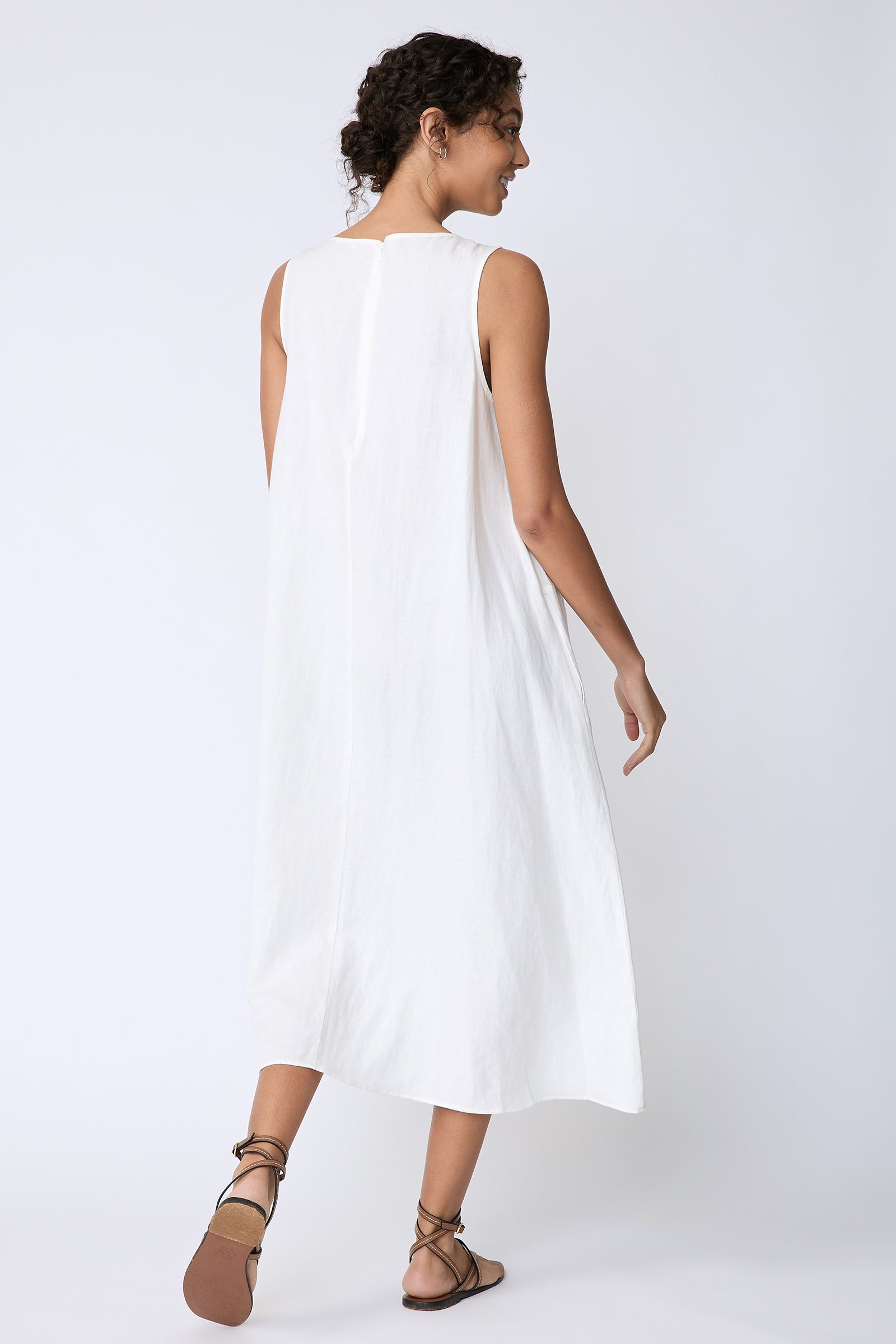 Kal Rieman Georgina Dress in Cotton Linen Ivory on model back view walking