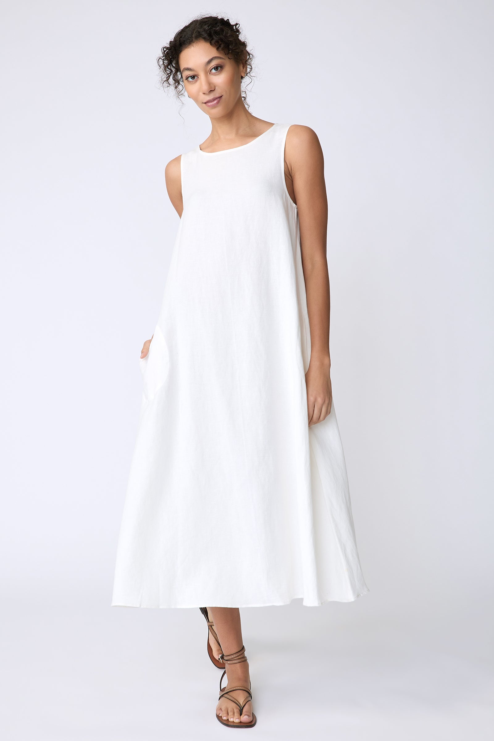 Kal Rieman Georgina Dress in Cotton Linen Ivory on model front view walking hand in pocket