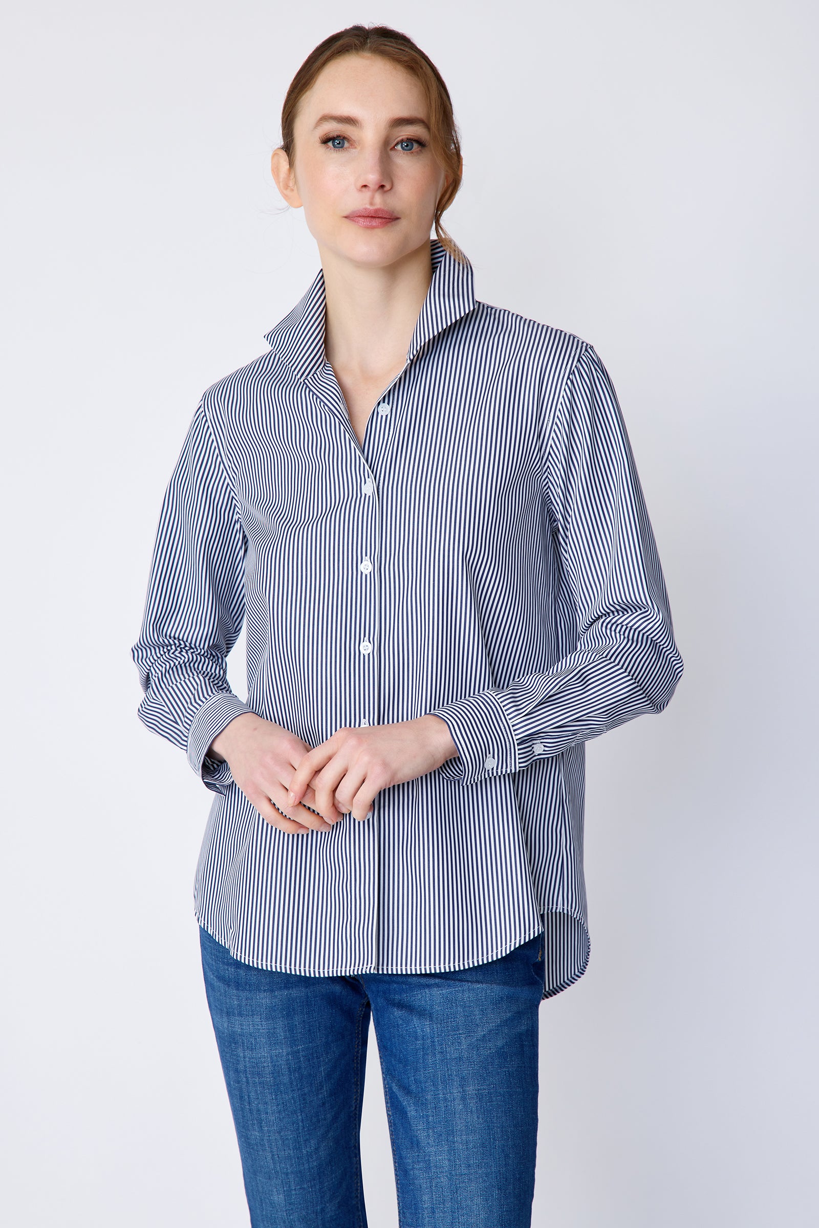 Kal Rieman Ginna Box Pleat Shirt in bengal stripe on model front view hands in front