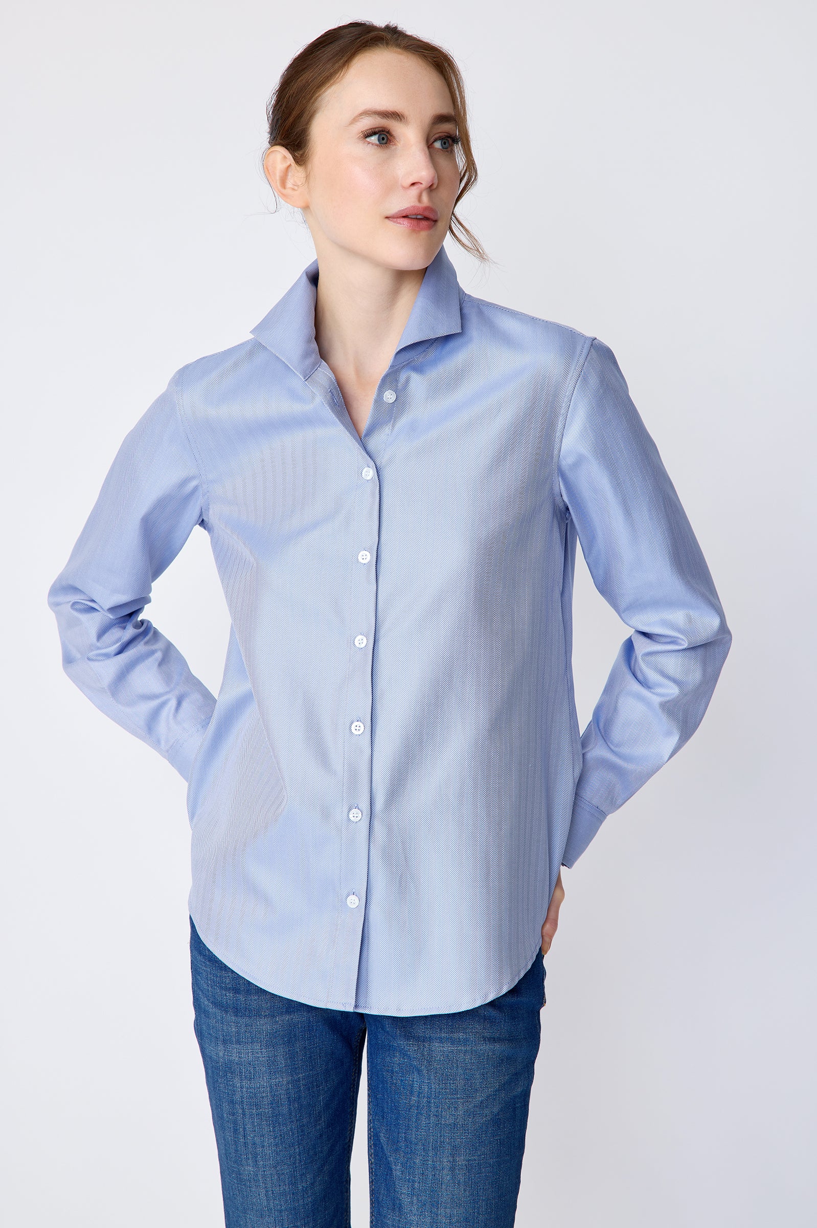 Kal Rieman Ginna Box Pleat Shirt in blue french blue herringbone on model front view hands in back pockets