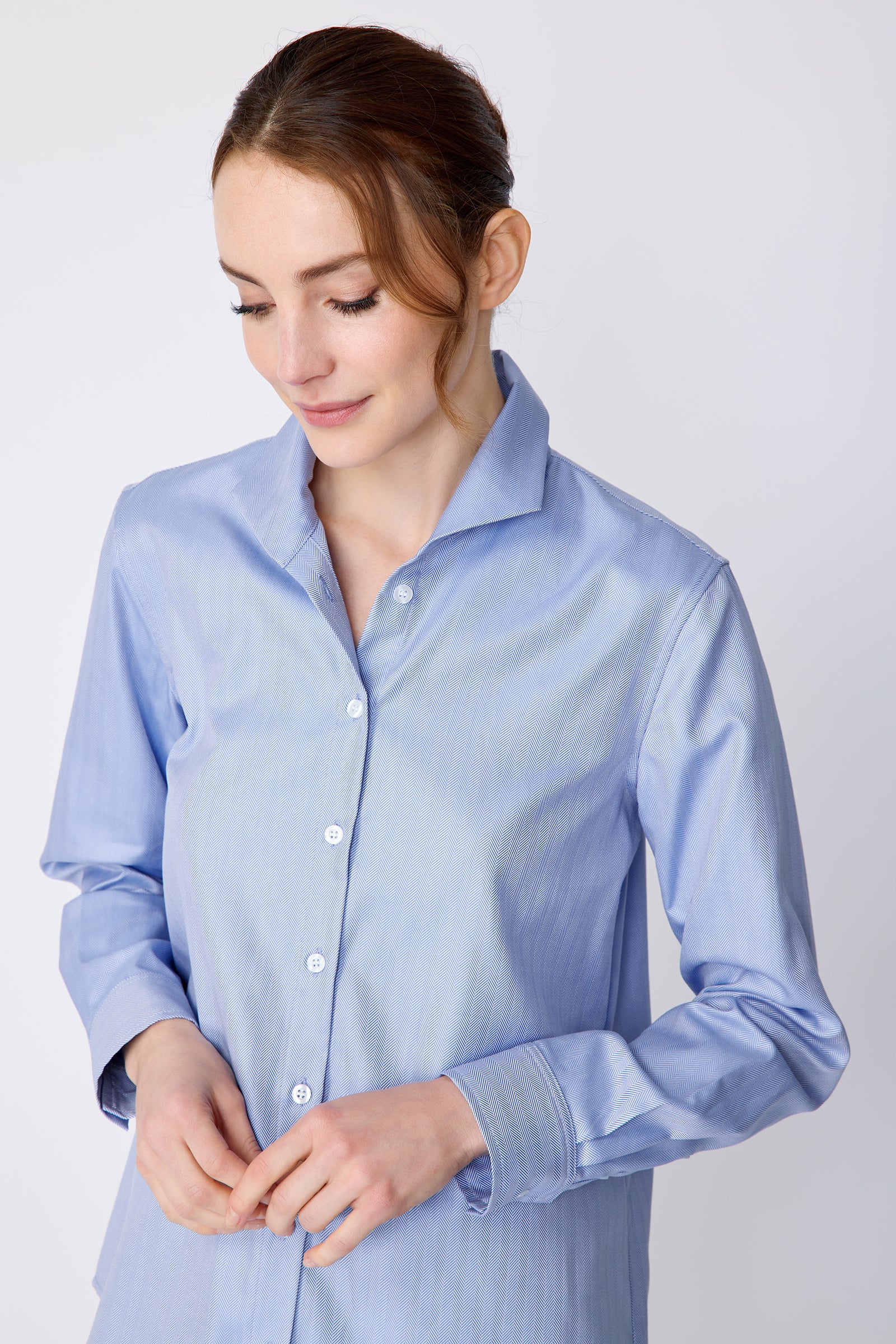 Kal Rieman Ginna Box Pleat Shirt in blue french blue herringbone on model front view looking down