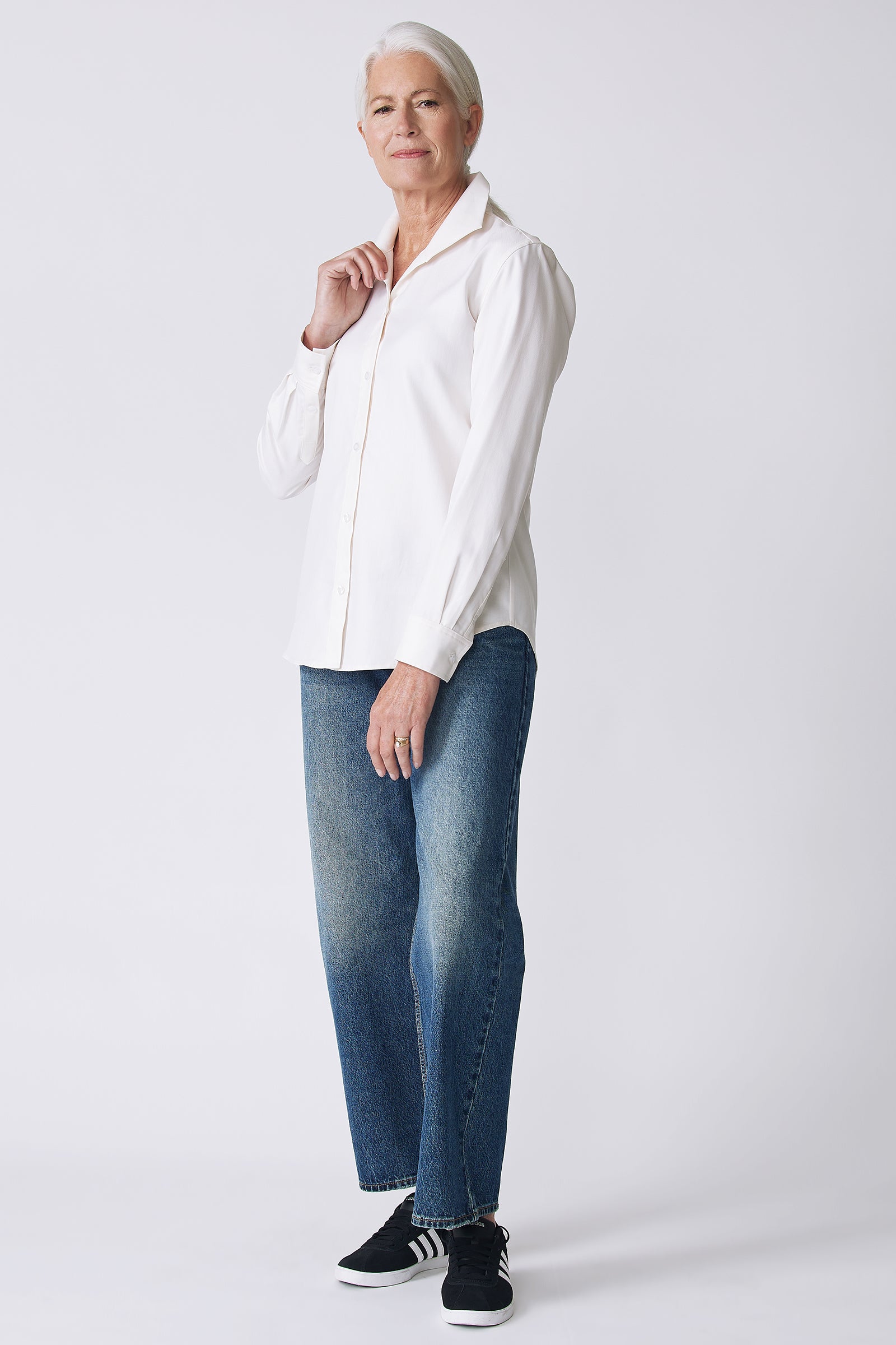 Kal Rieman Ginna Box Pleat Shirt in Ivory Fine Herringbone on Model Front View holding collar