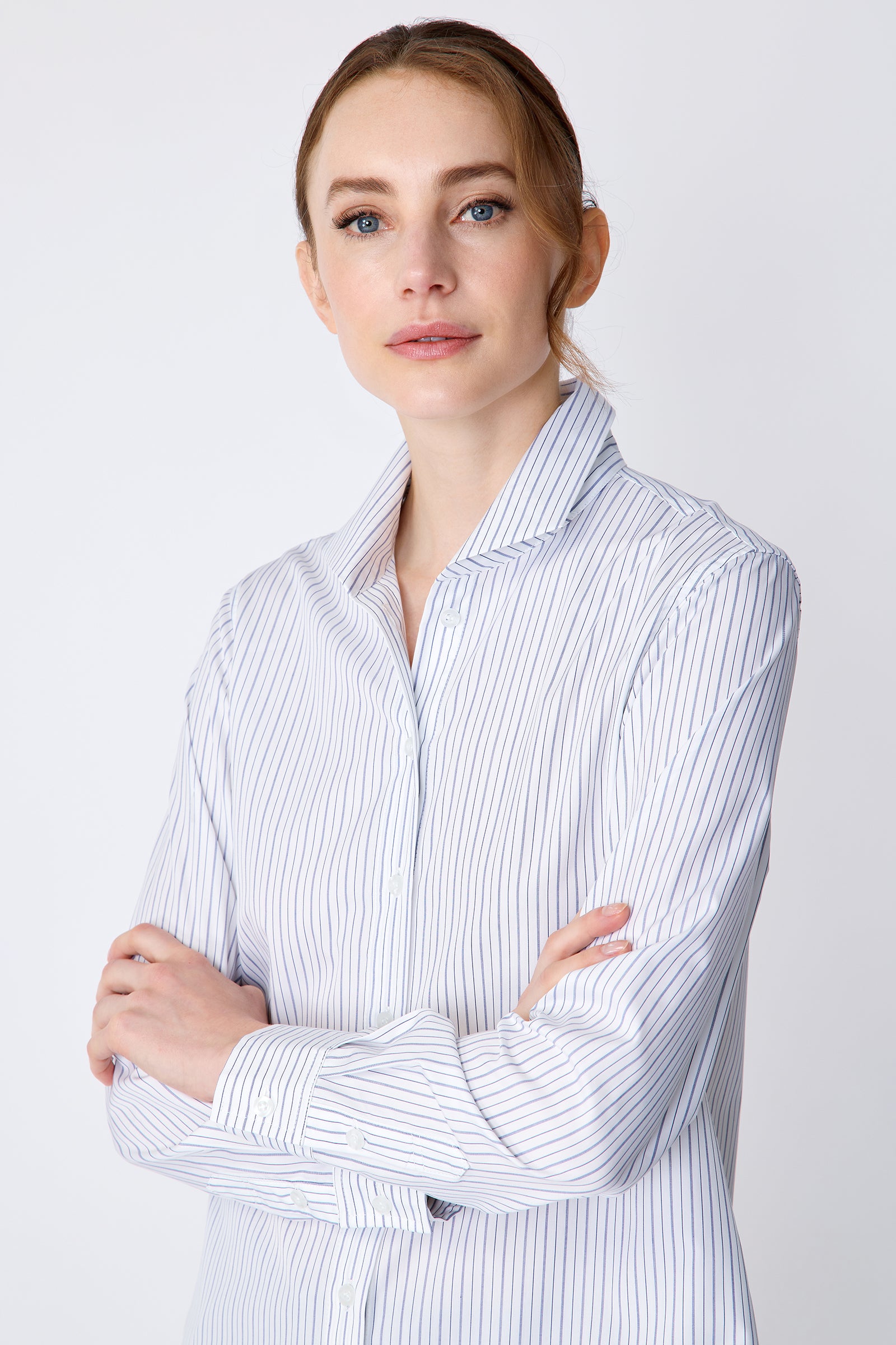 Kal Rieman Ginna Box Pleat Tailored Shirt in Varied Stripe on model front view arms crossed in front