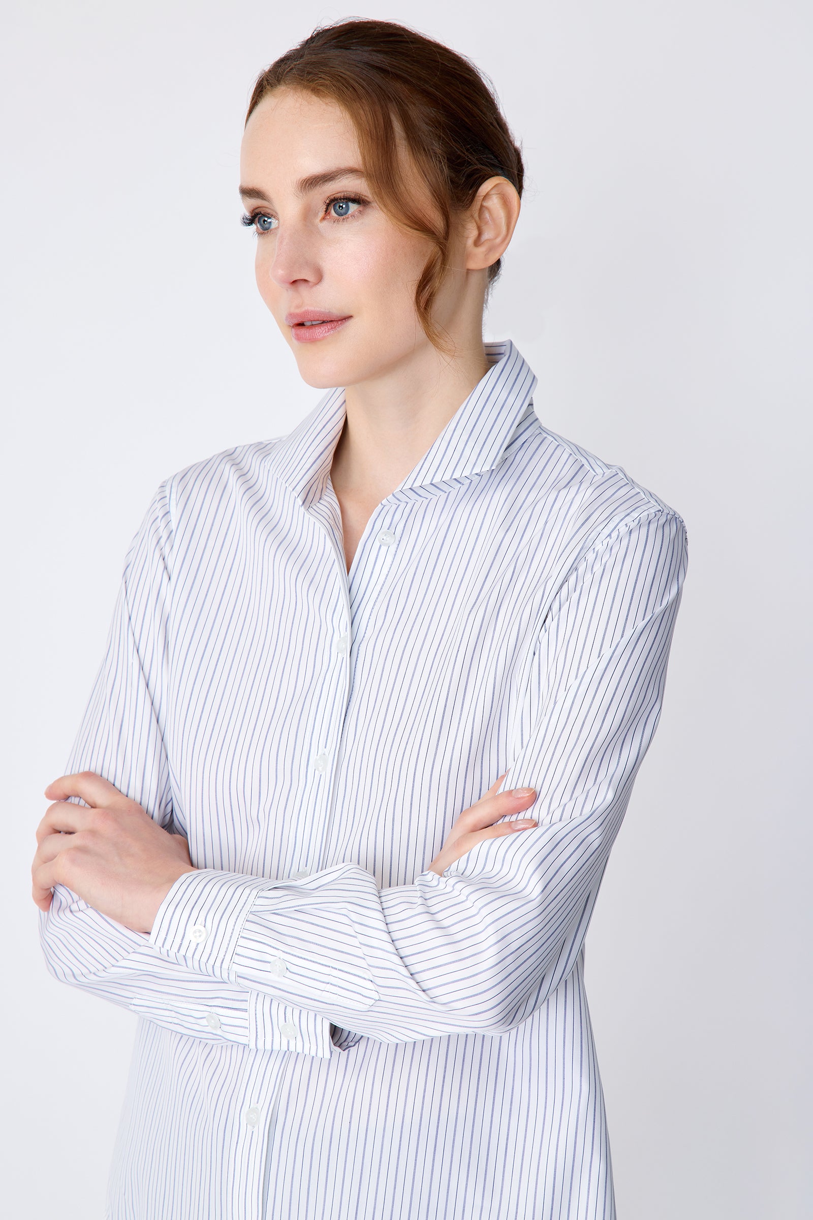 Kal Rieman Ginna Box Pleat Tailored Shirt in Varied Stripe on model side view arms crossed in front