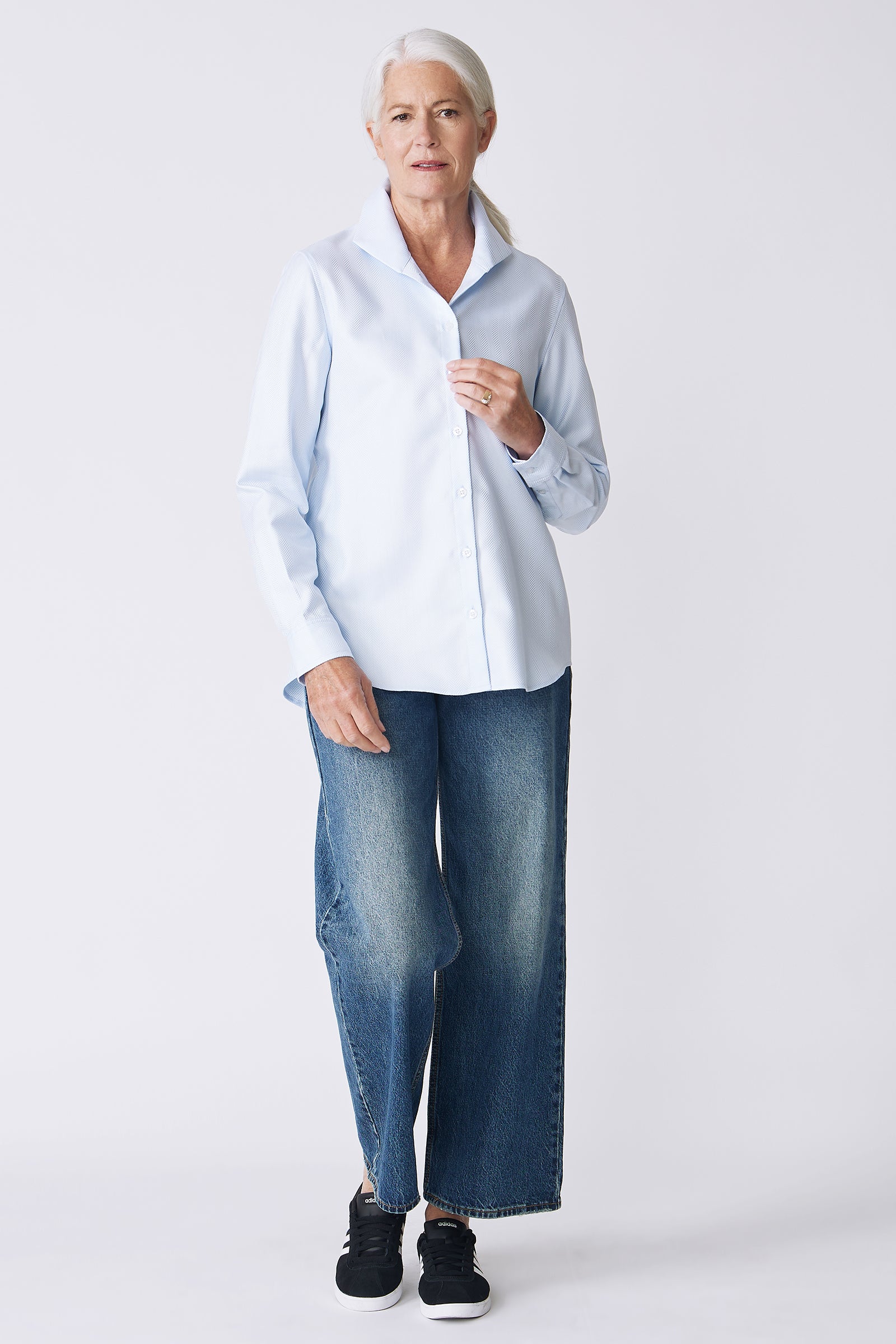 Kal Rieman Ginna Box Pleat Shirt in French Blue Herringbone on Model front view full holding button placket