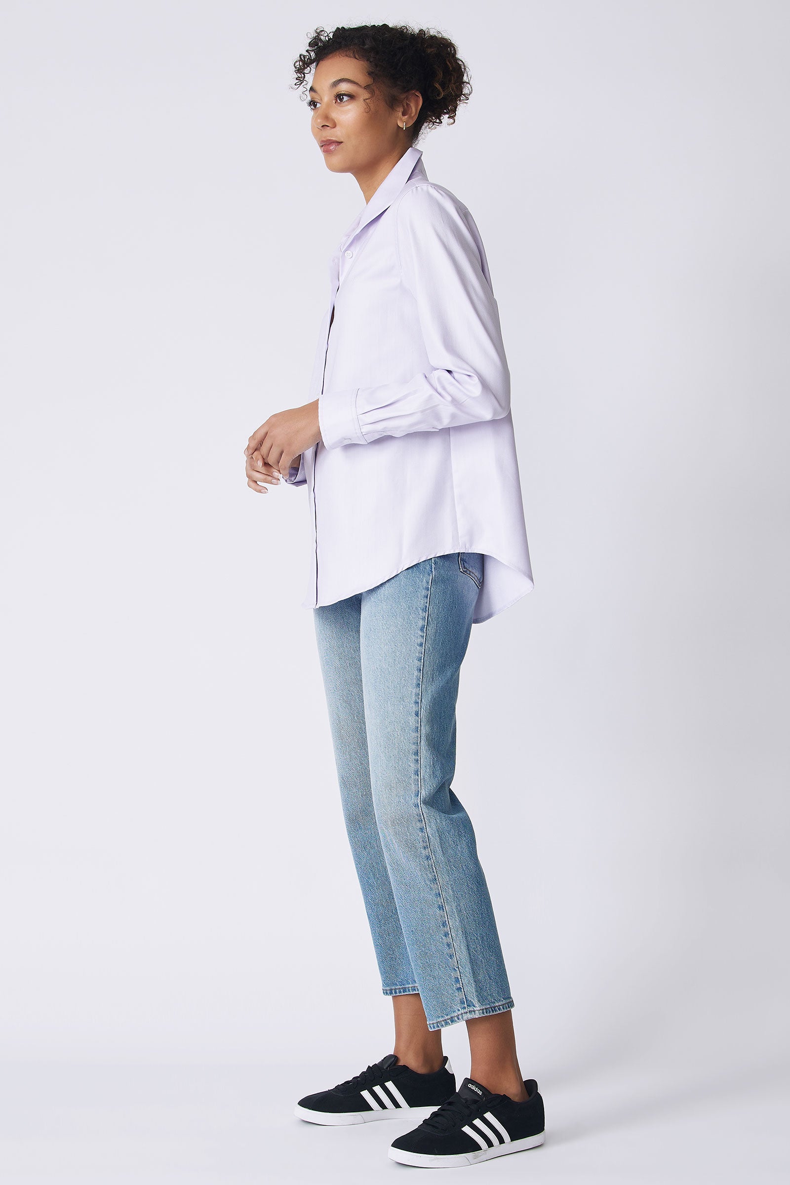 Kal Rieman Ginna Box Pleat Tailored Shirt in lavender fine herringbone on model side view holding hands
