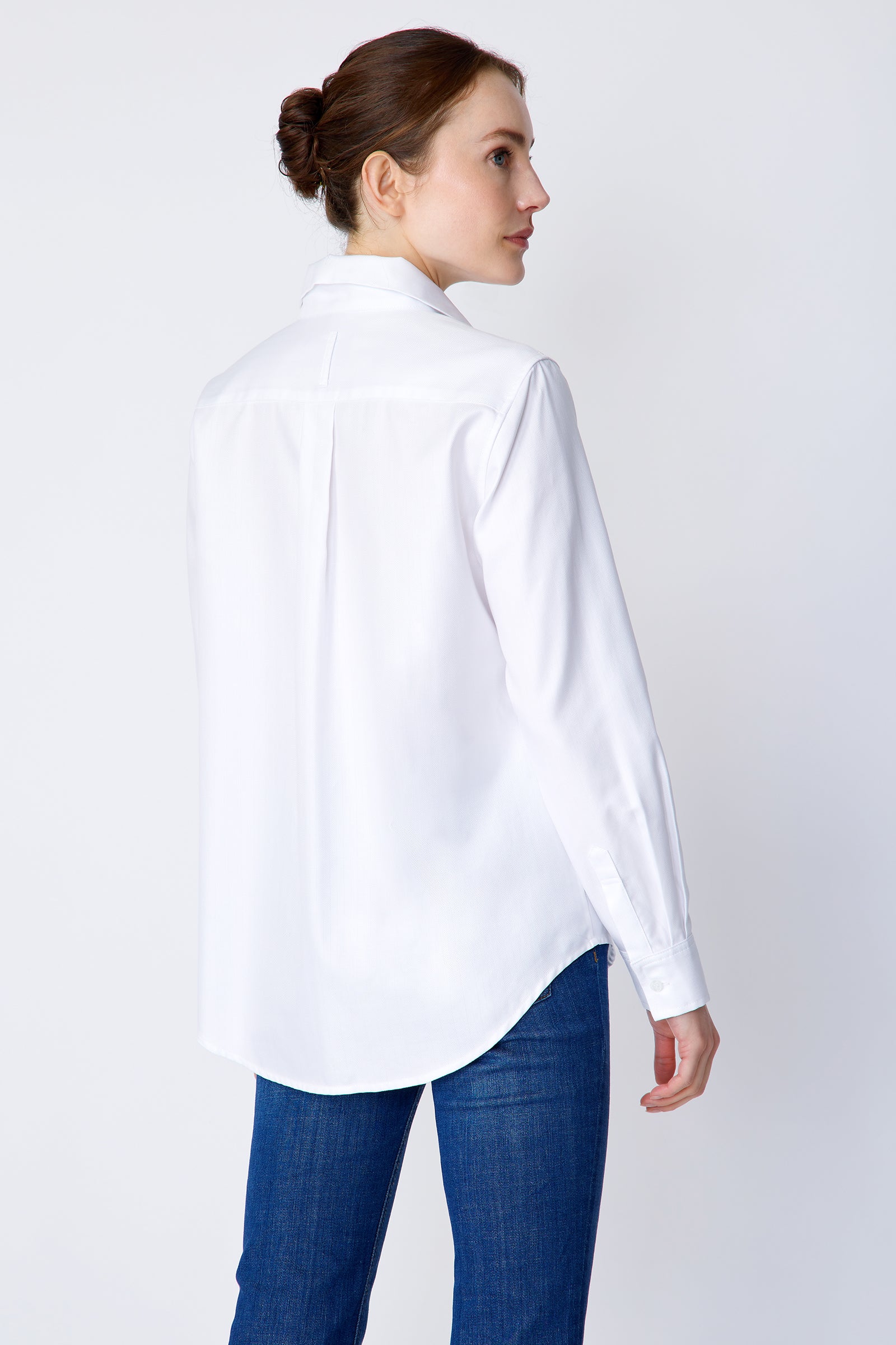 Kal Rieman Ginna Box Pleat Tailored Shirt in white fine herringbone on model front view arms by side