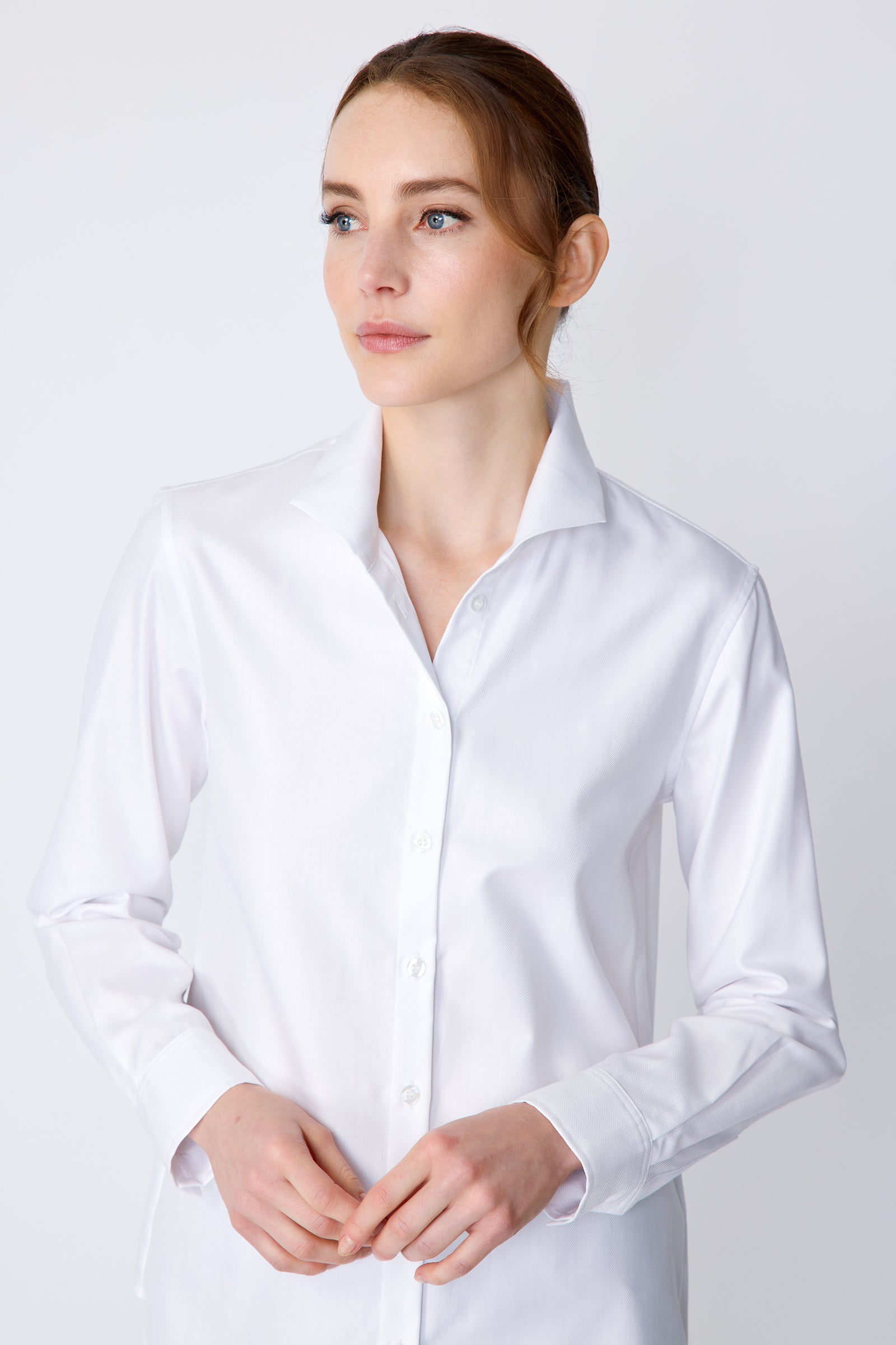 Kal Rieman Ginna Box Pleat Tailored Shirt in white fine herringbone on model front view detail