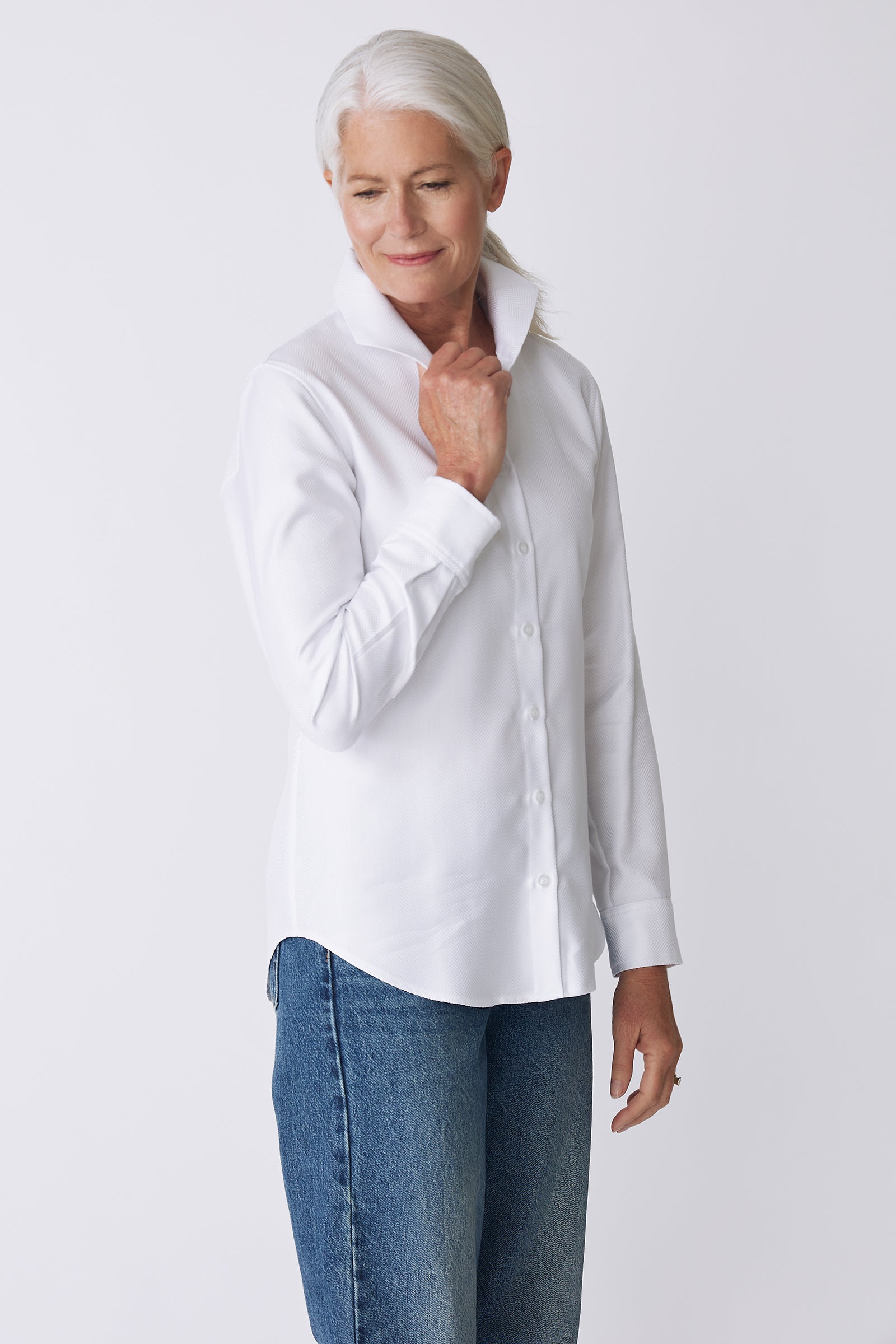 Kal Rieman Ginna Box Pleat Shirt in White Herringbone on Model Side View holding collar