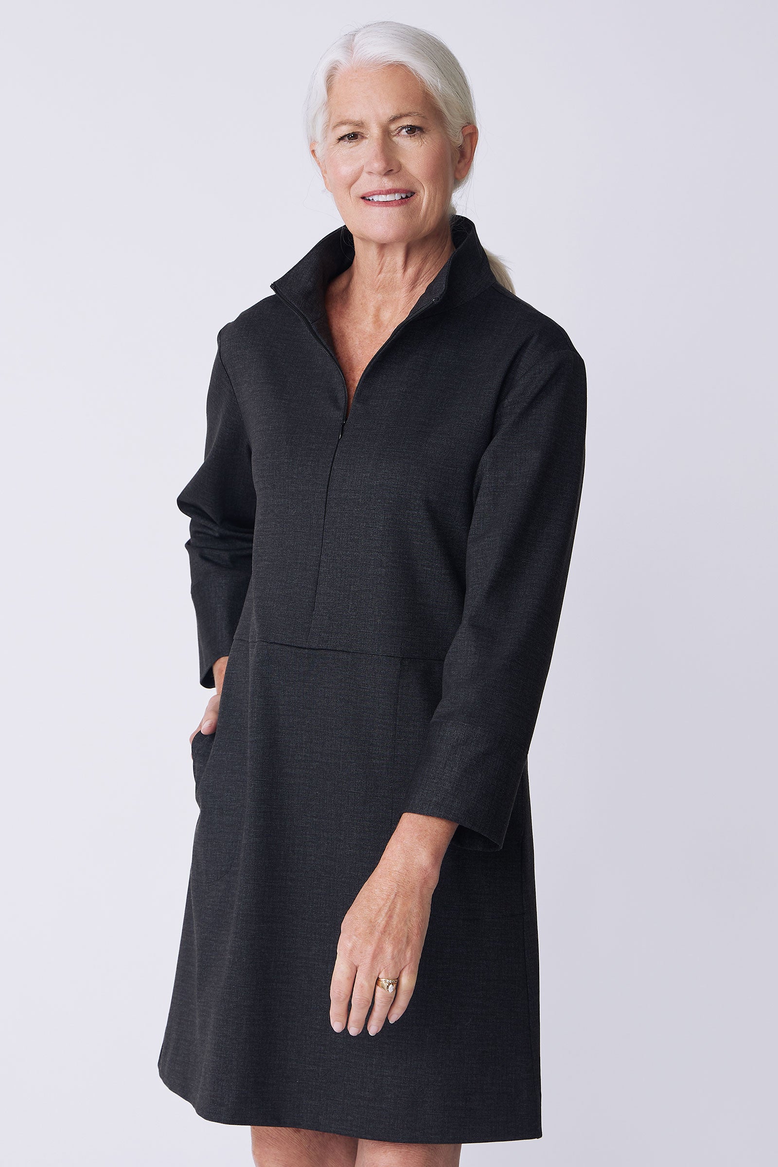 Kal Rieman Harper Dress in charcoal ponte on model front view hand in pocket