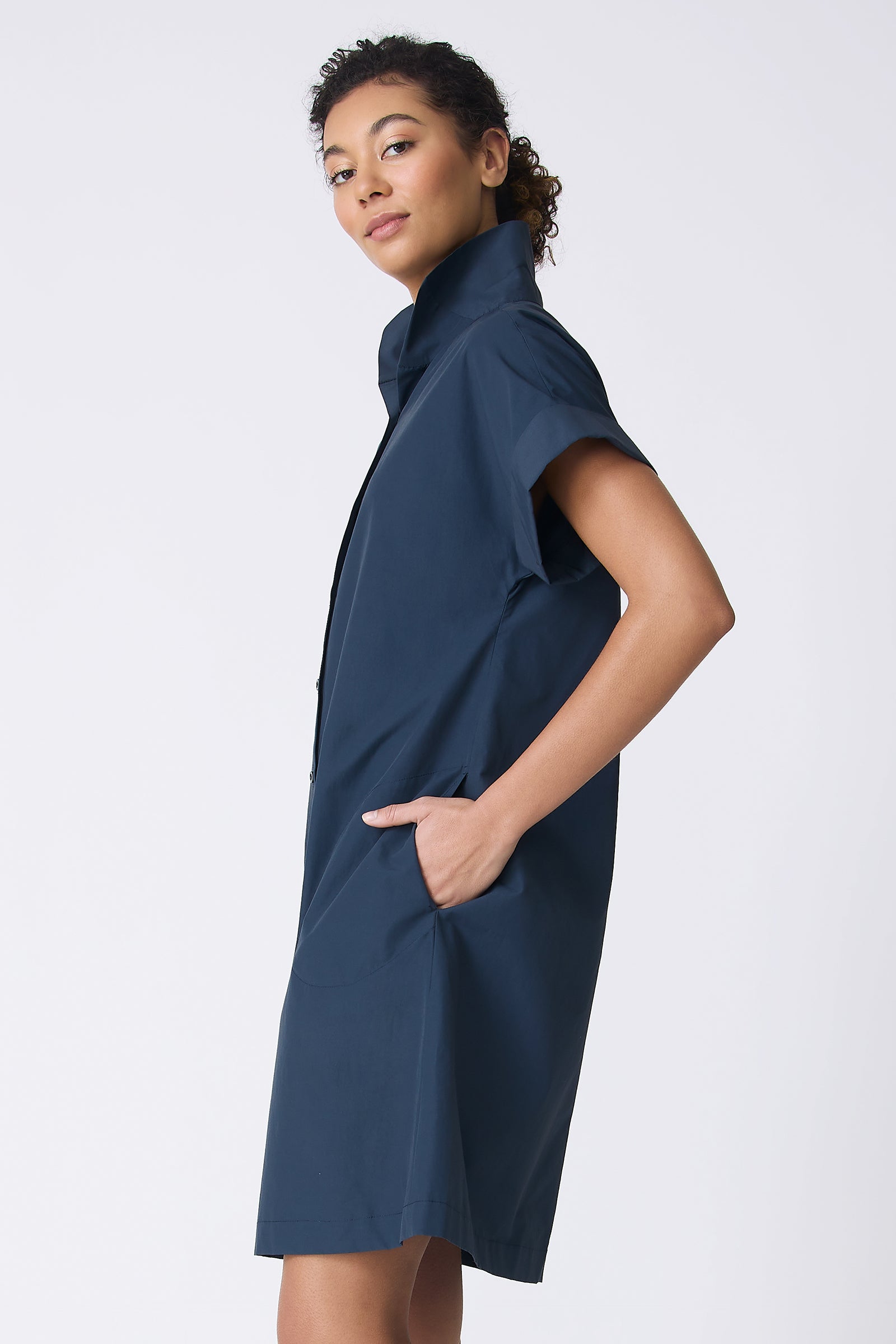 Kal Rieman Holly Kimono Dress in Summer Navy on model with hand in pocket side view