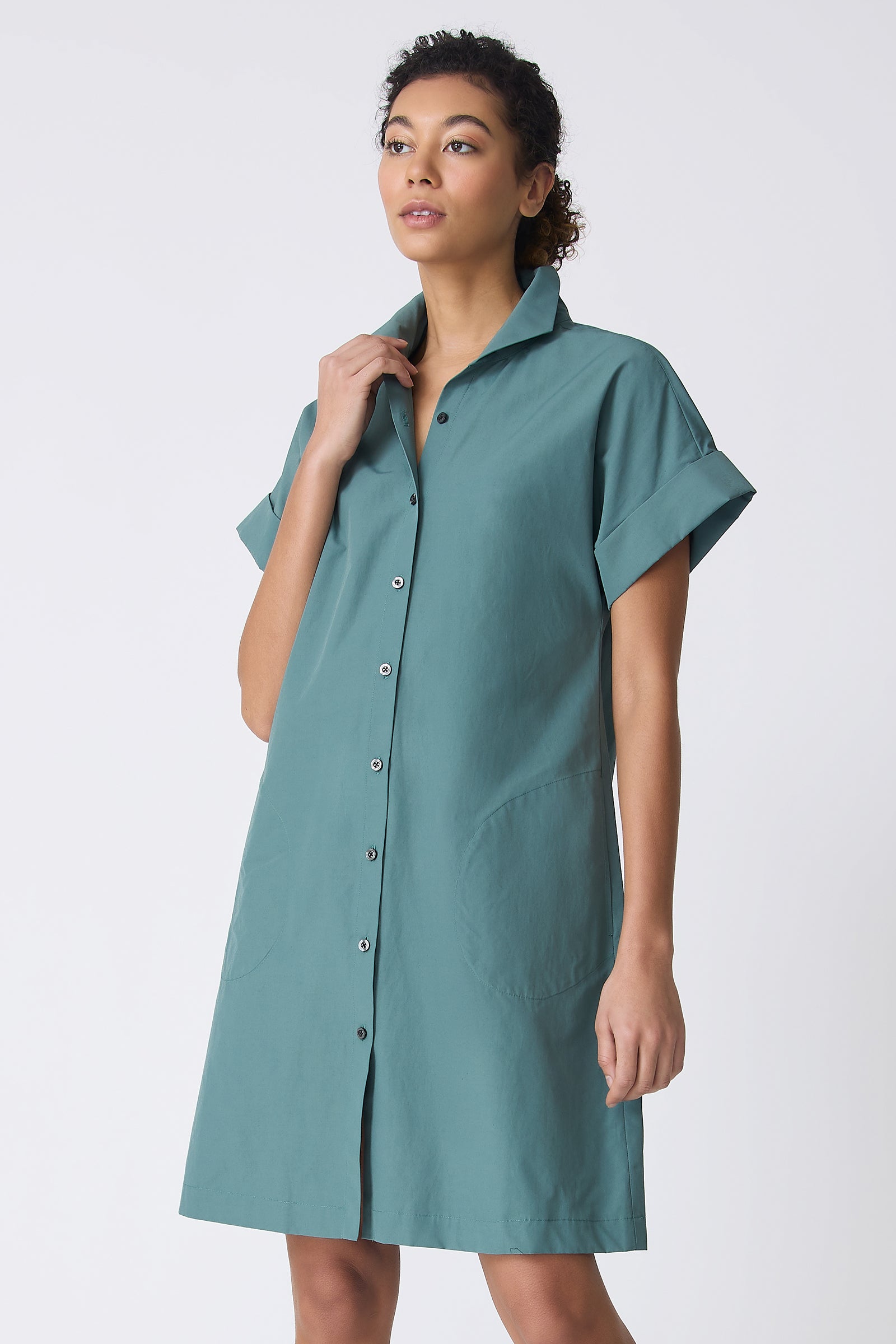 Kal Rieman Holly Kimono Dress in Sage on model touching collar front view