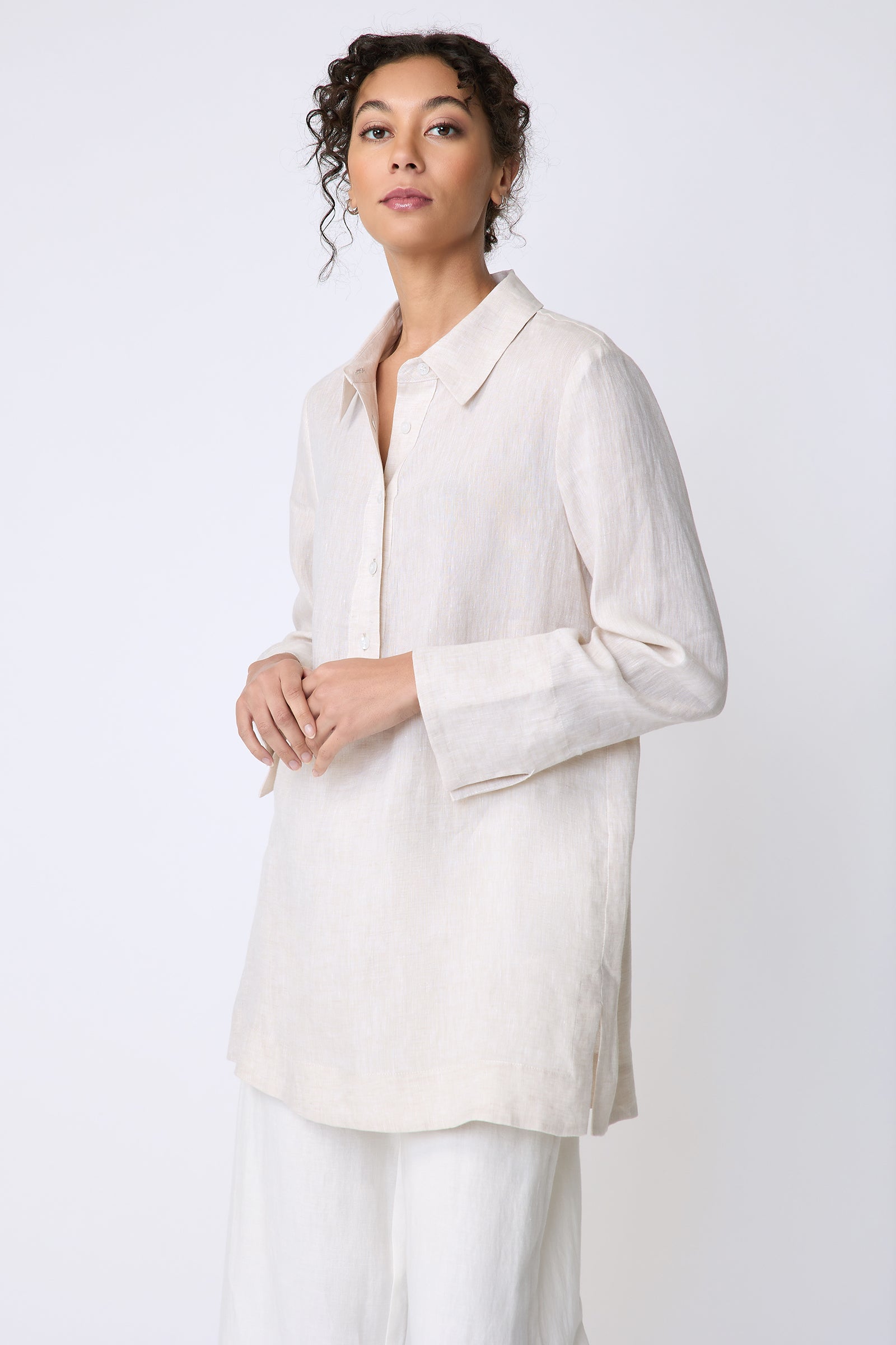 Kal Rieman Inez Placket Tunic in linen color sand on front view hands in front