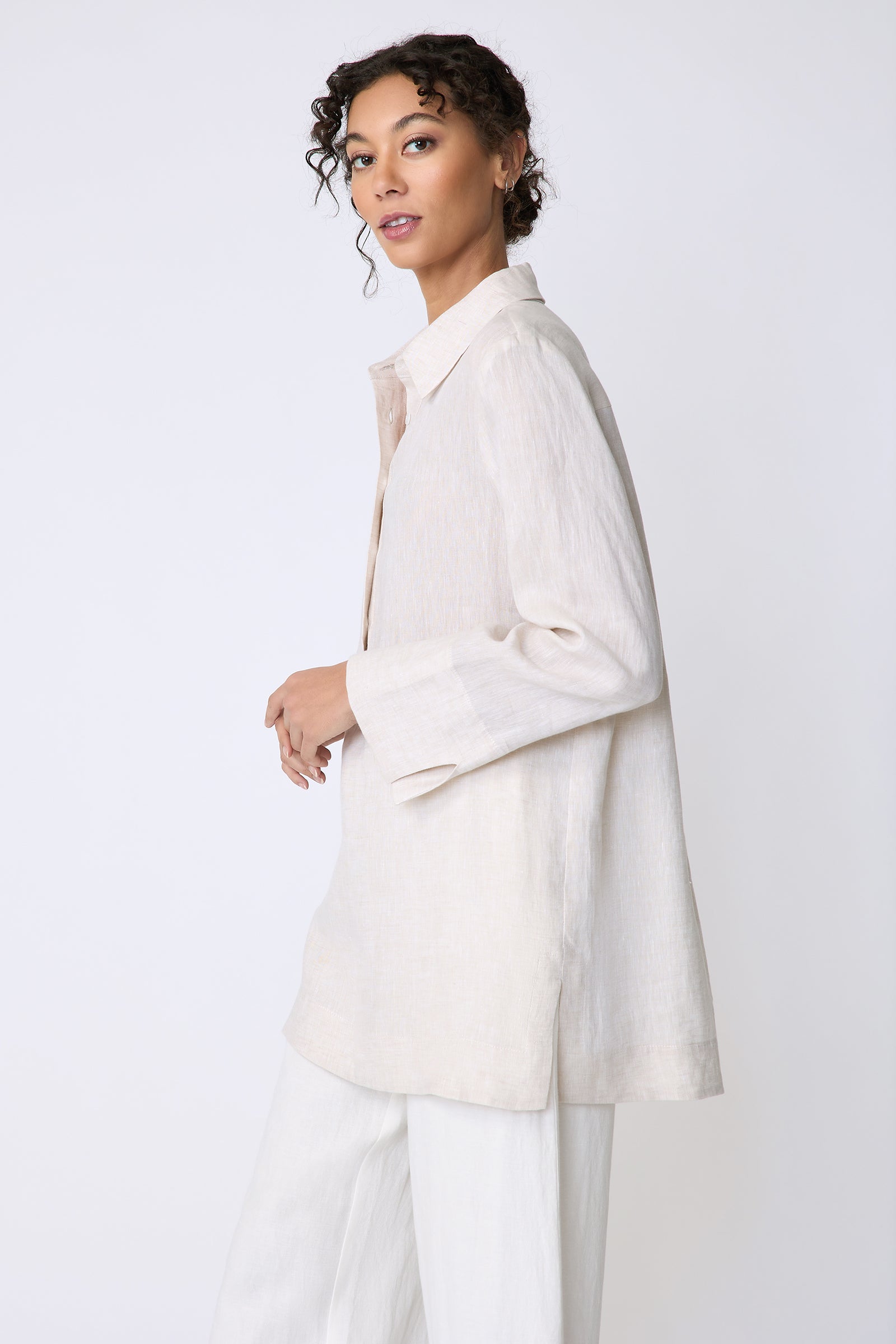 Kal Rieman Inez Placket Tunic in linen color sand on side view hand in front