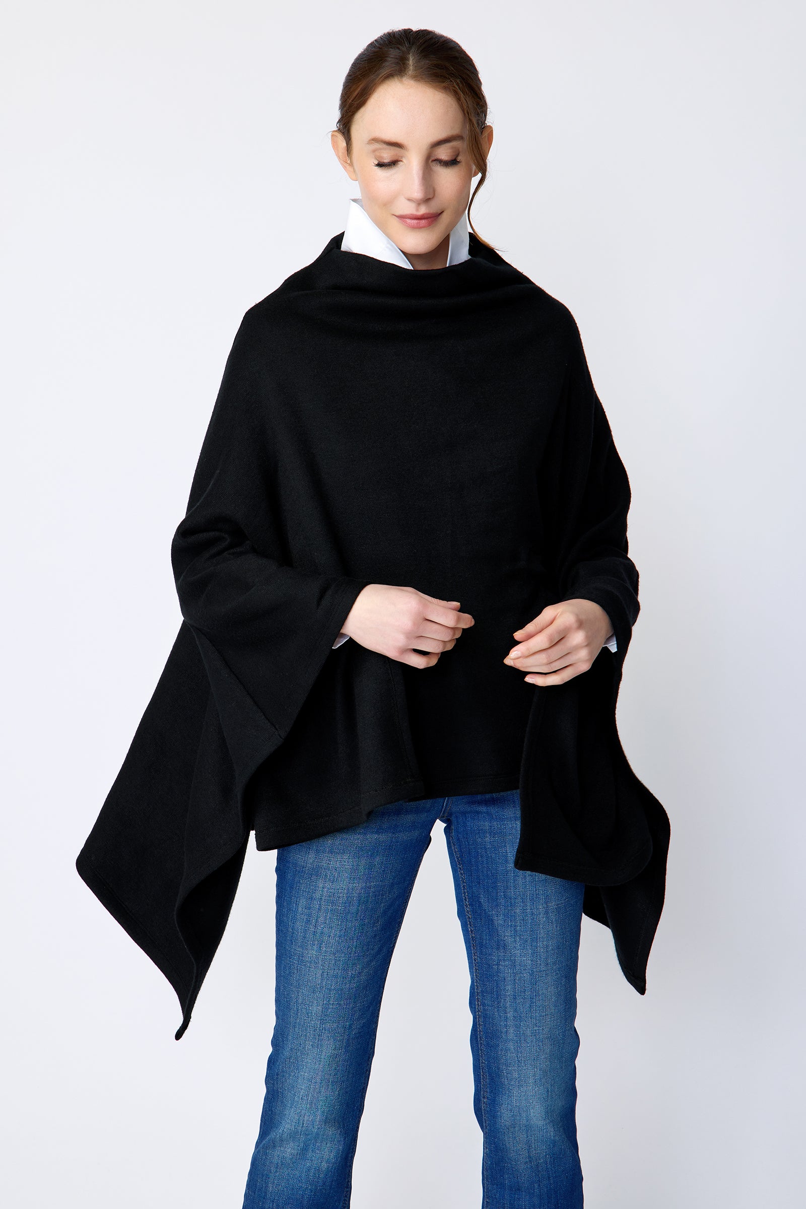 Kal Rieman Jackie Poncho in black soft knit on model front view looking down