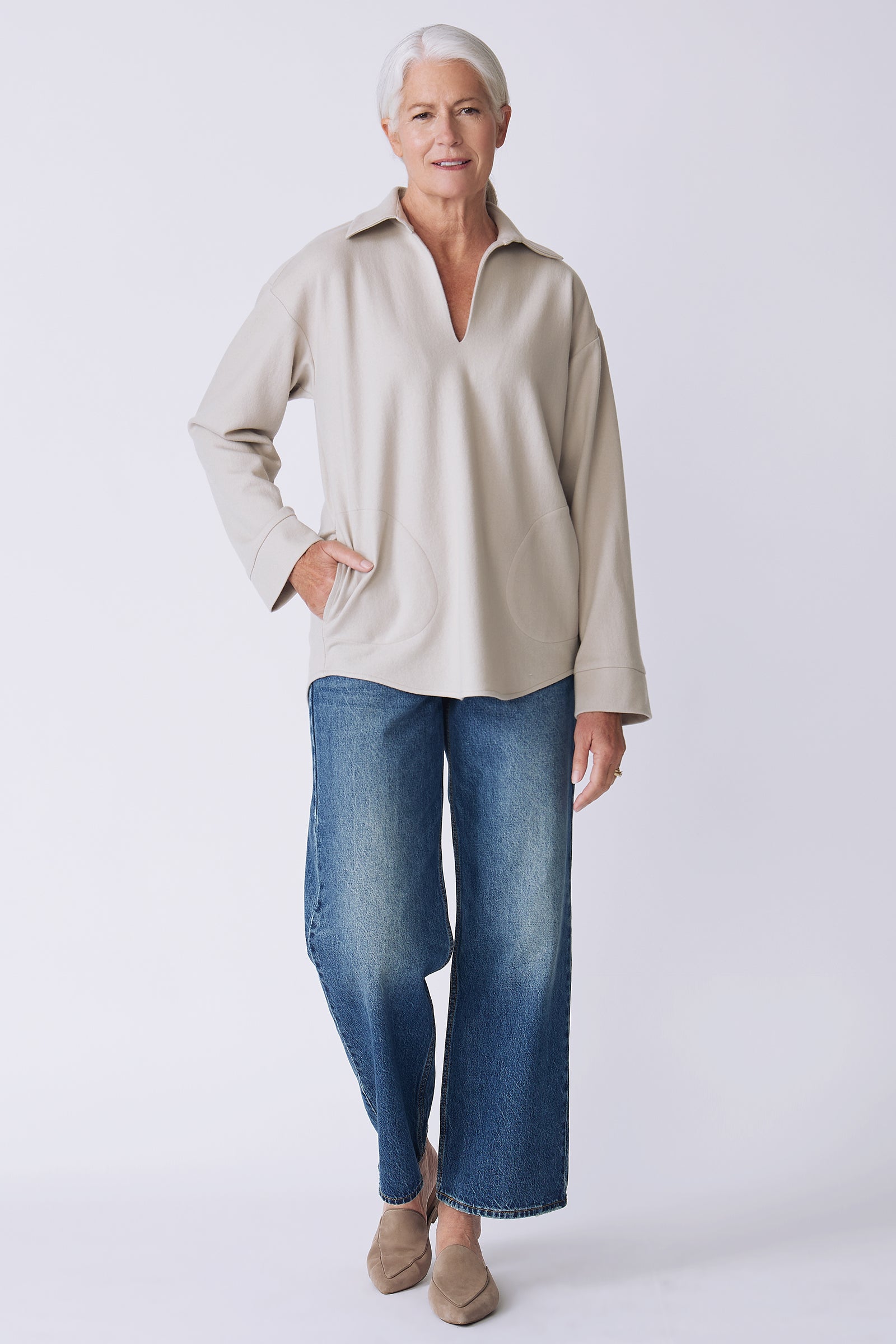 Kal Rieman Julian pullover in mink felted jersey on model front view walking hand in pocket