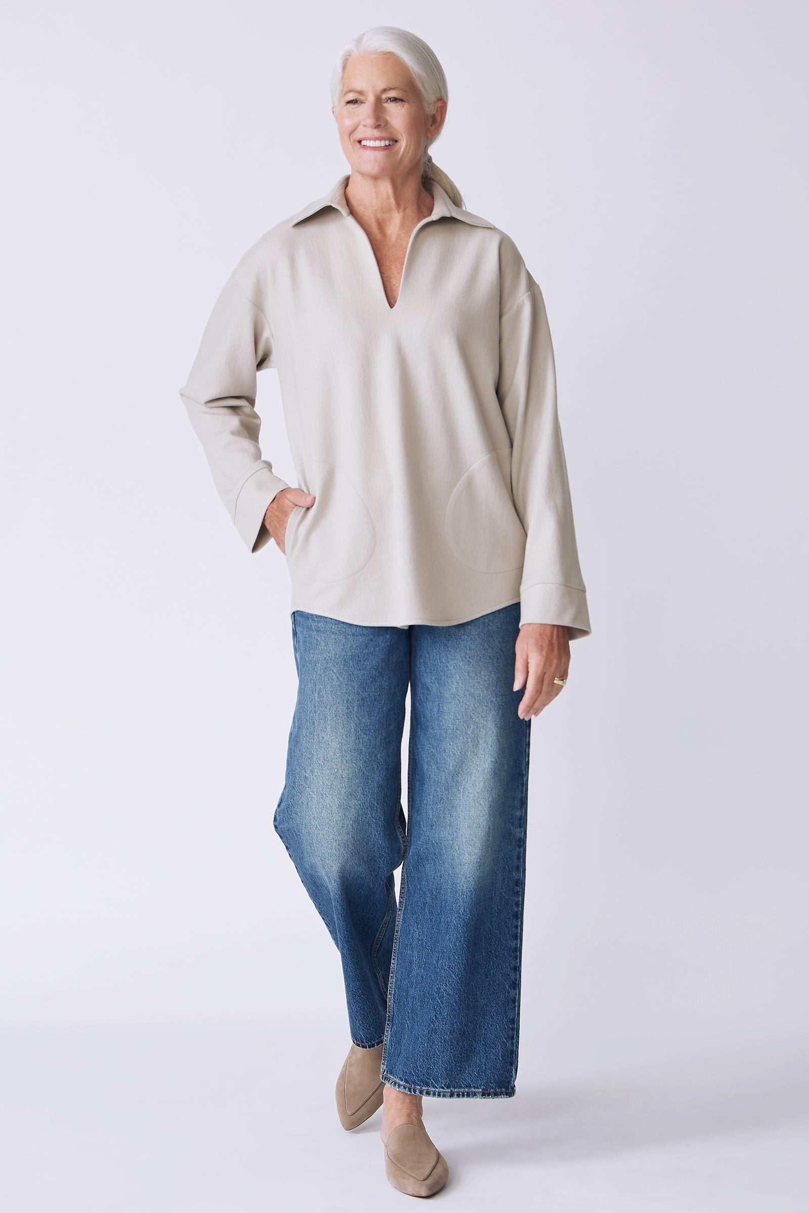Kal Rieman Julian pullover in mink felted jersey on model front view walking