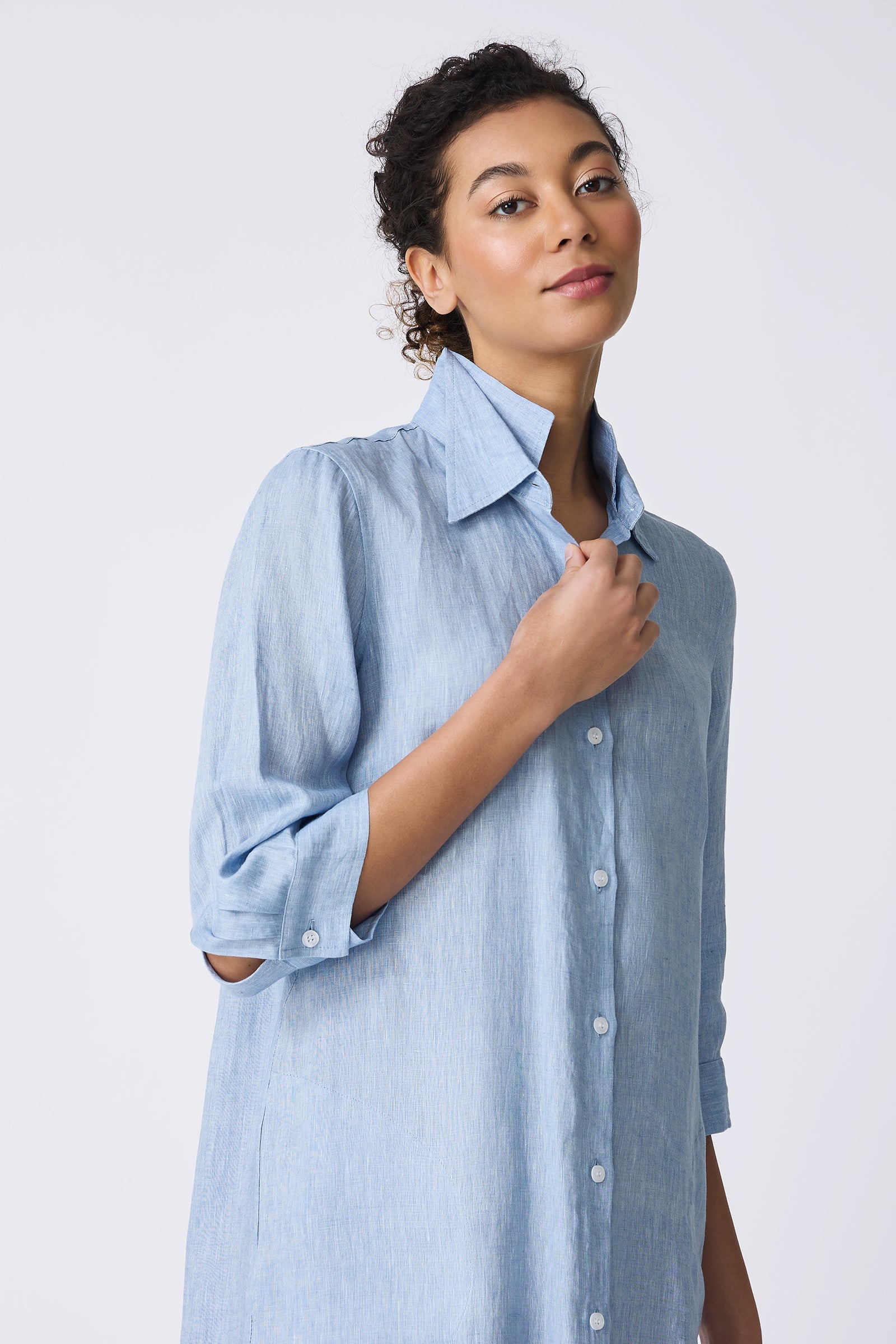 Kal Rieman Katie Shirt Dress in Sky Blue on model touching button front view