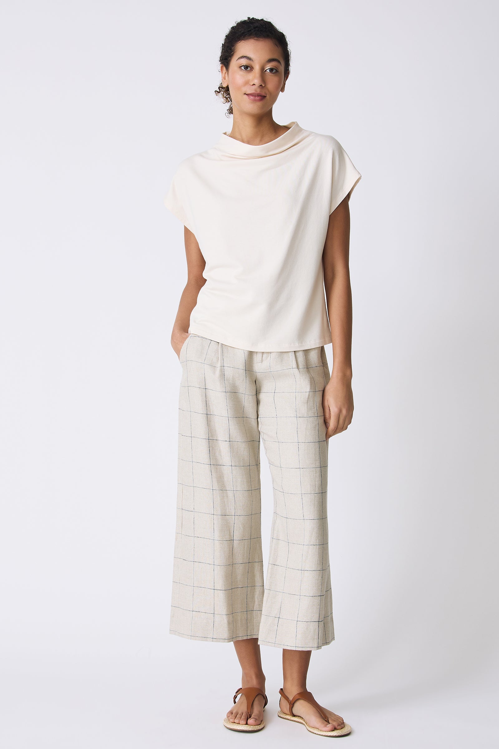 Kal Rieman Luca Cowl Top in Ivory on model with hand in pocket full front view