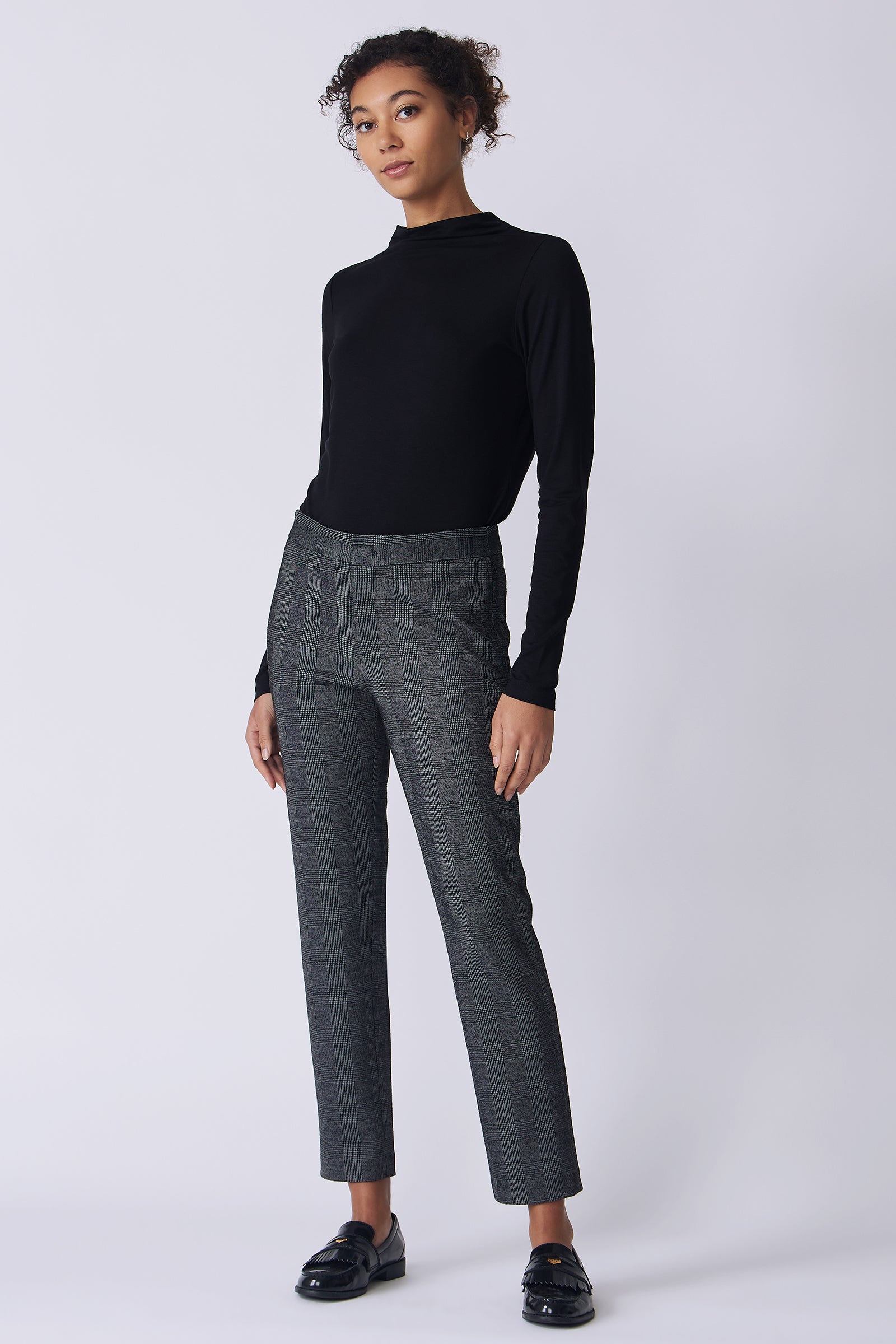 Kal Rieman Madison Pant in black plaid on model side view