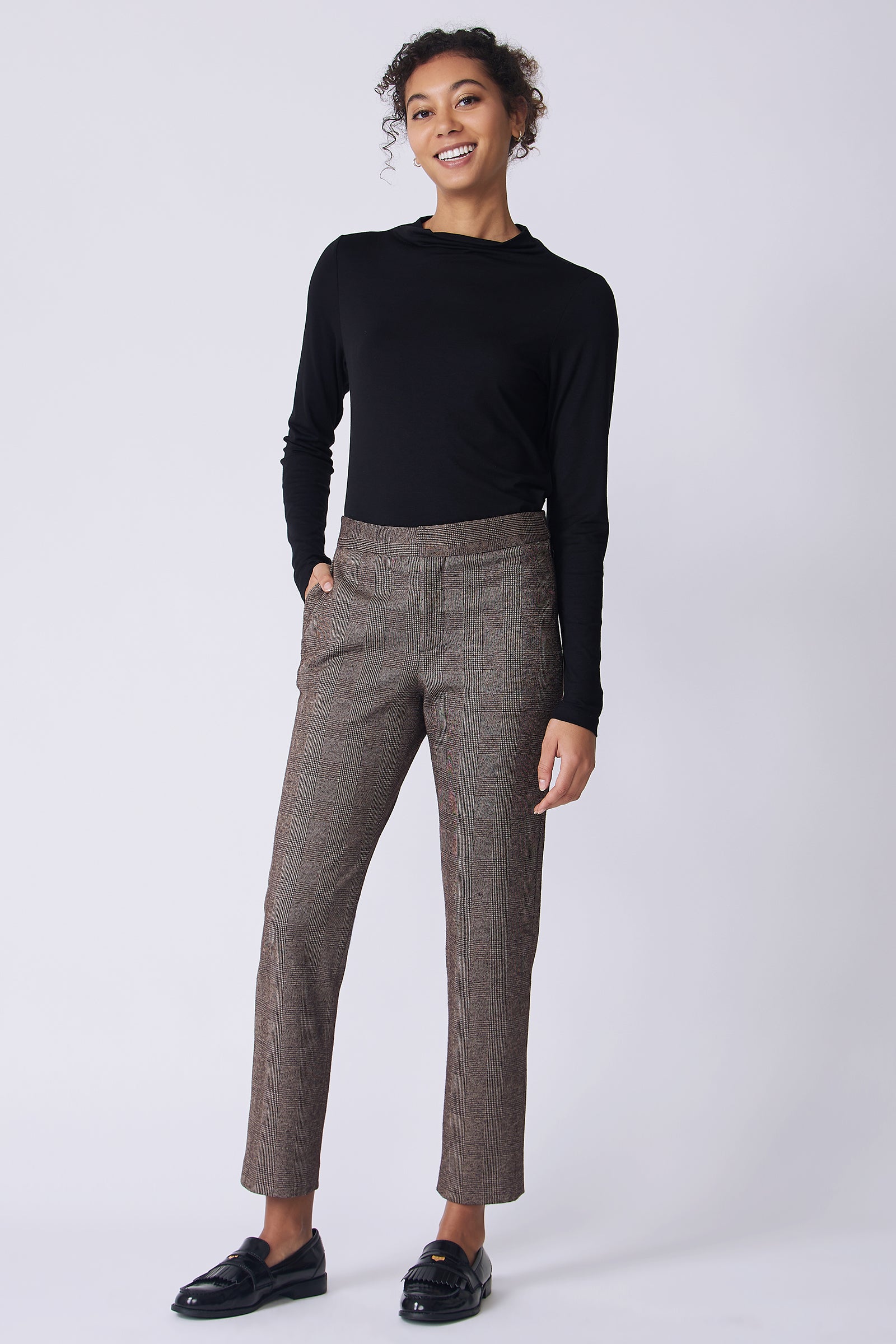 Kal Rieman Madison Pant in brown plaid on model front view hand in pocket