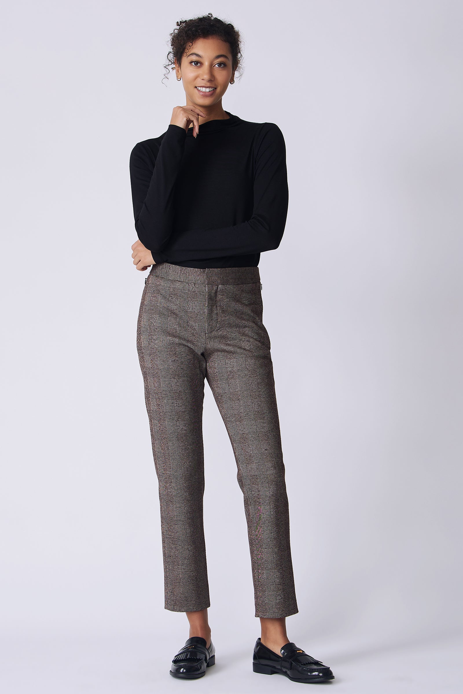 Kal Rieman Madison Pant in brown plaid on model front view hand on chin