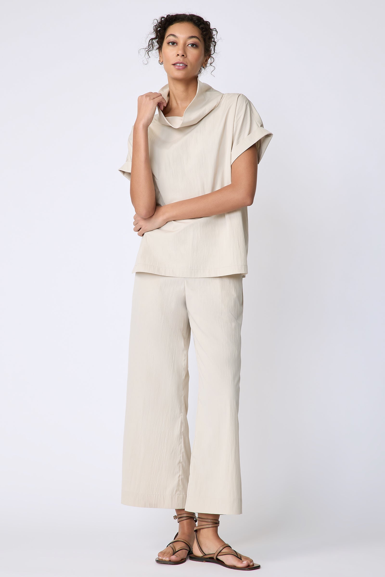 Kal Rieman Maggie Top in Typewriter Cloth khaki on model front view full look holding collar