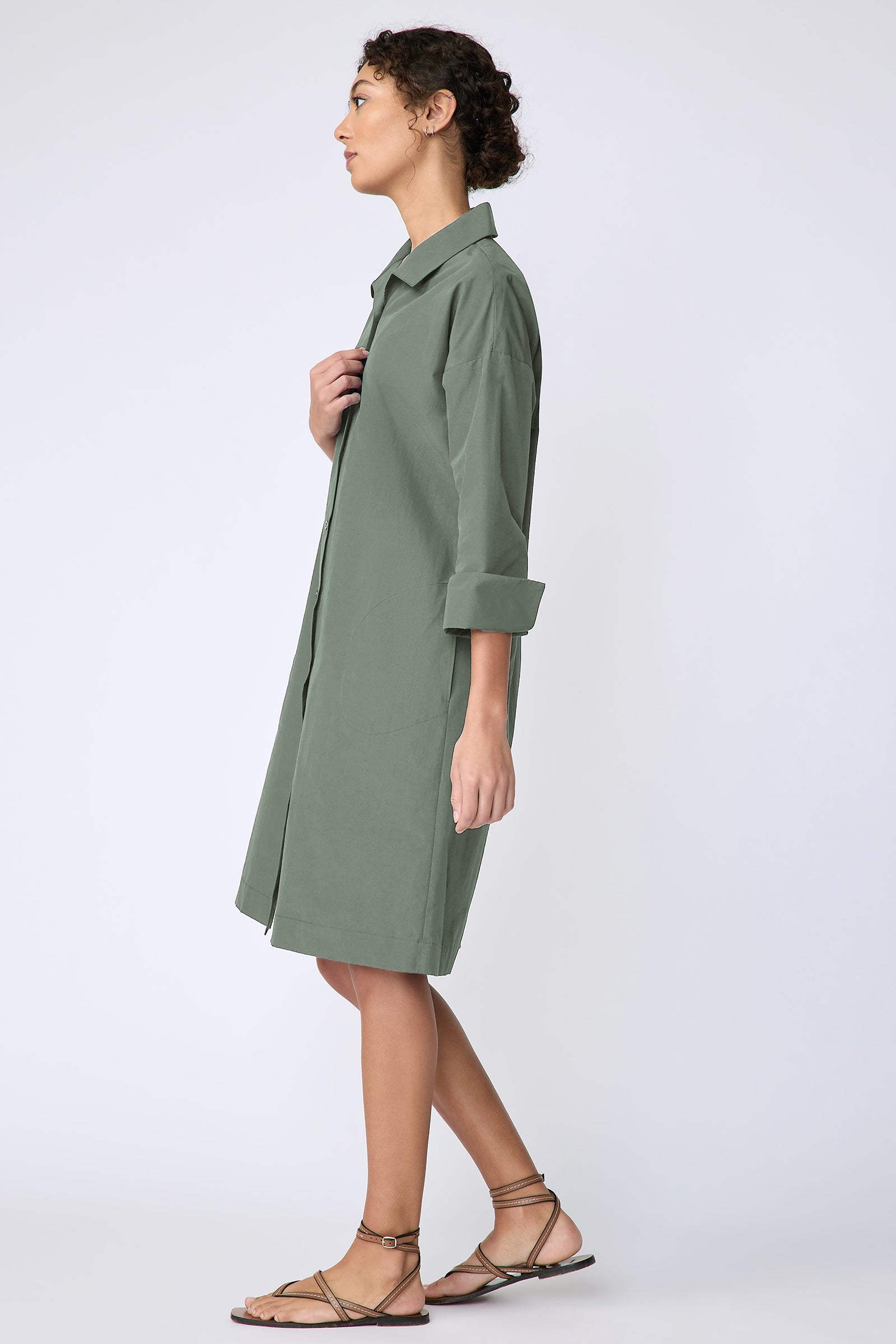 Kal Rieman Marion Dress in Cactus broadcloth on model side view walking