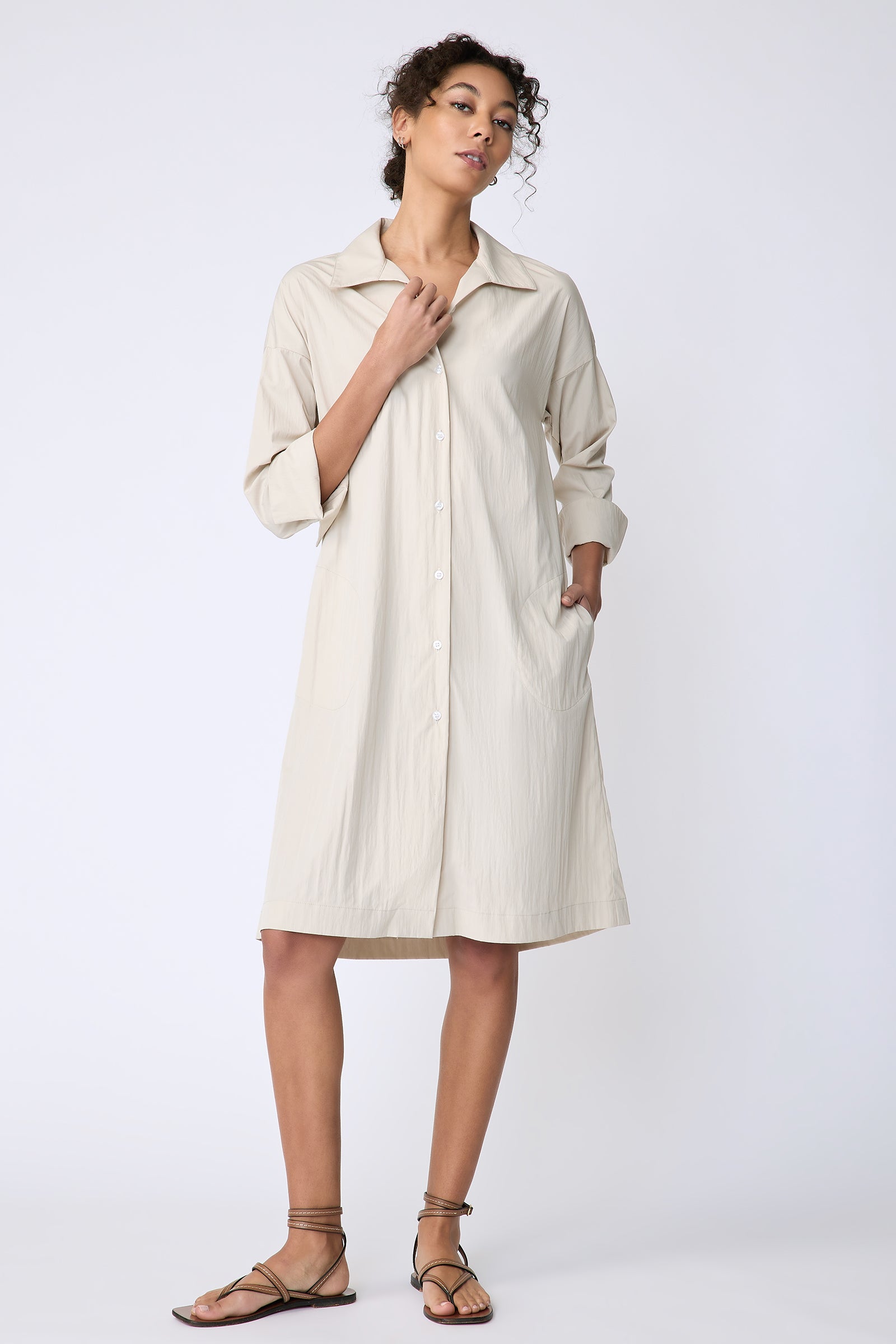 Kal Rieman Marion Shirt Dress in Typewriter cloth khaki on model front view hand on collar