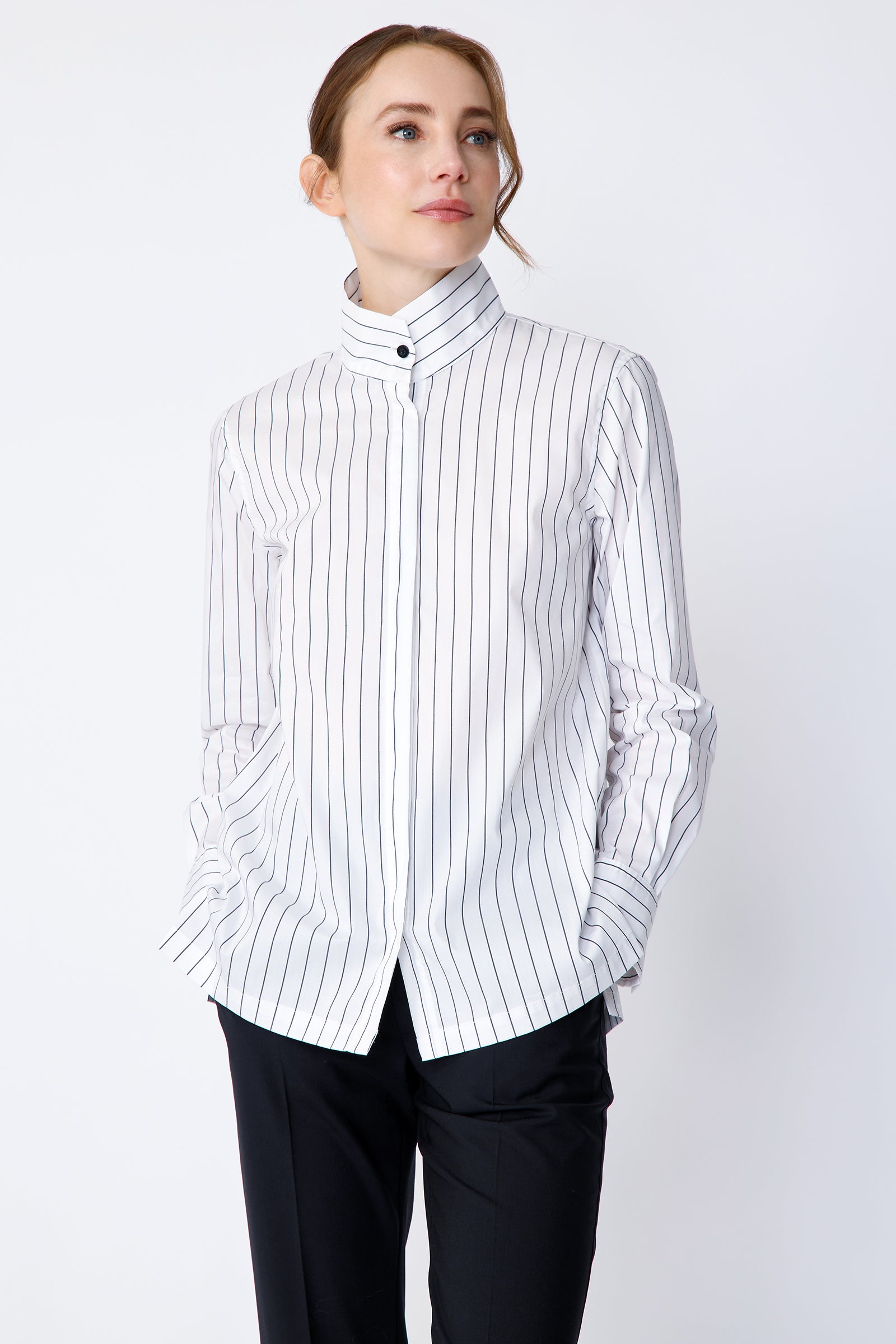 Kal Rieman Marlene Shirt in Piano Stripe stretch shirting on model front view hands in pockets