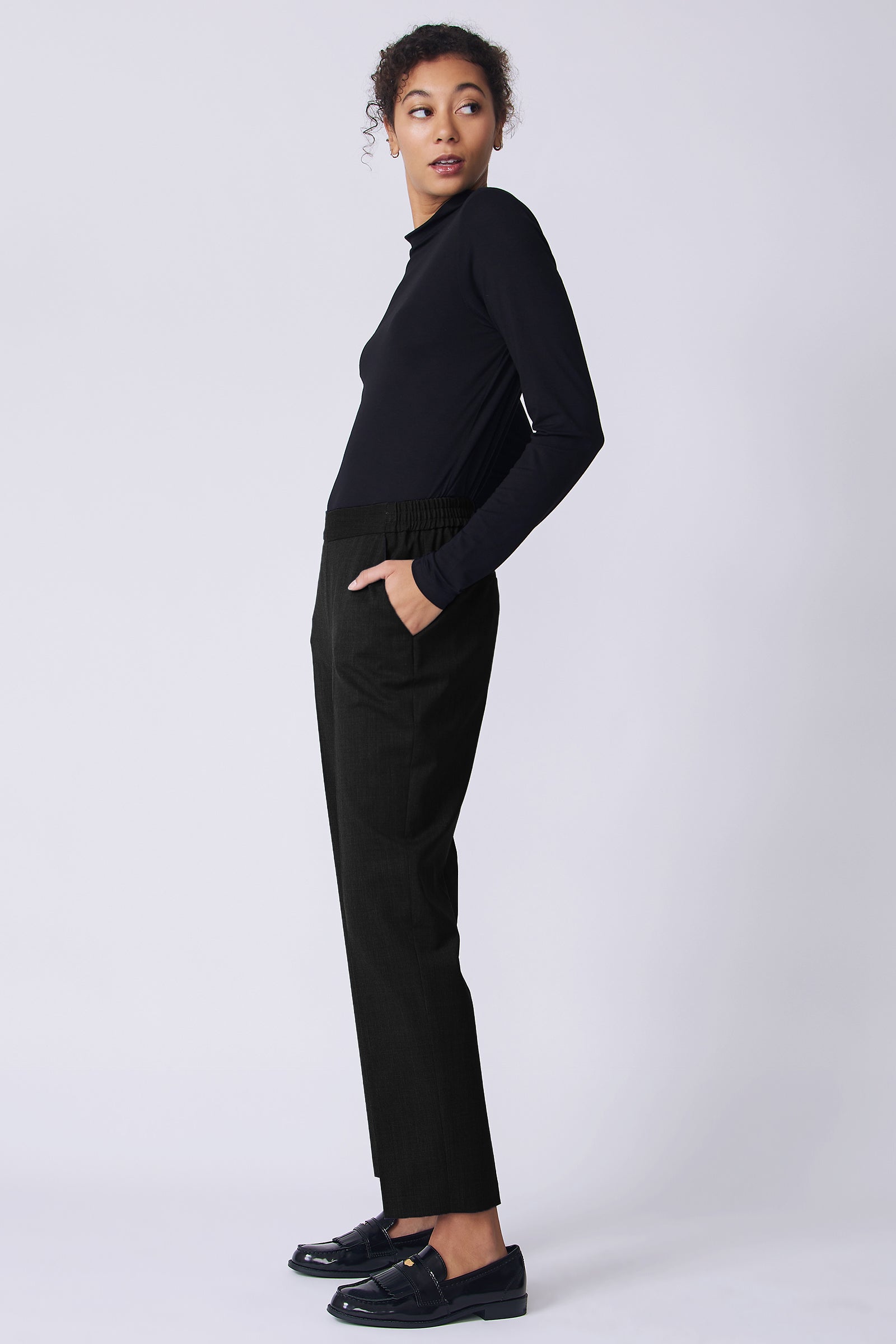 Kal Rieman Martine Trouser in Black wool suiting on model side view