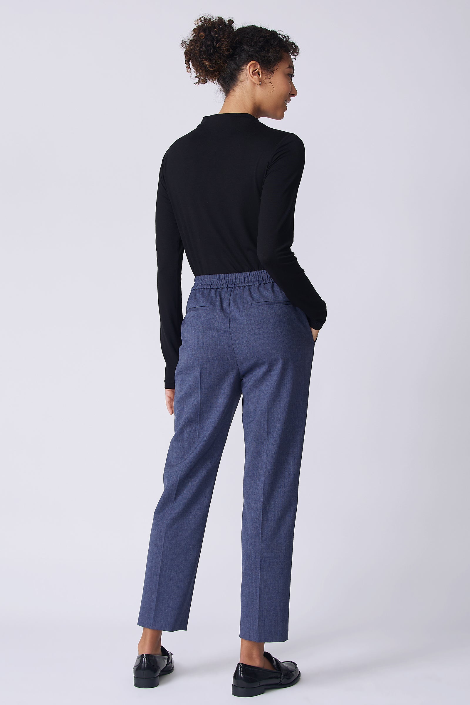 Kal Rieman Martin Trouser in Italian denim suiting on model back view hand in pocket