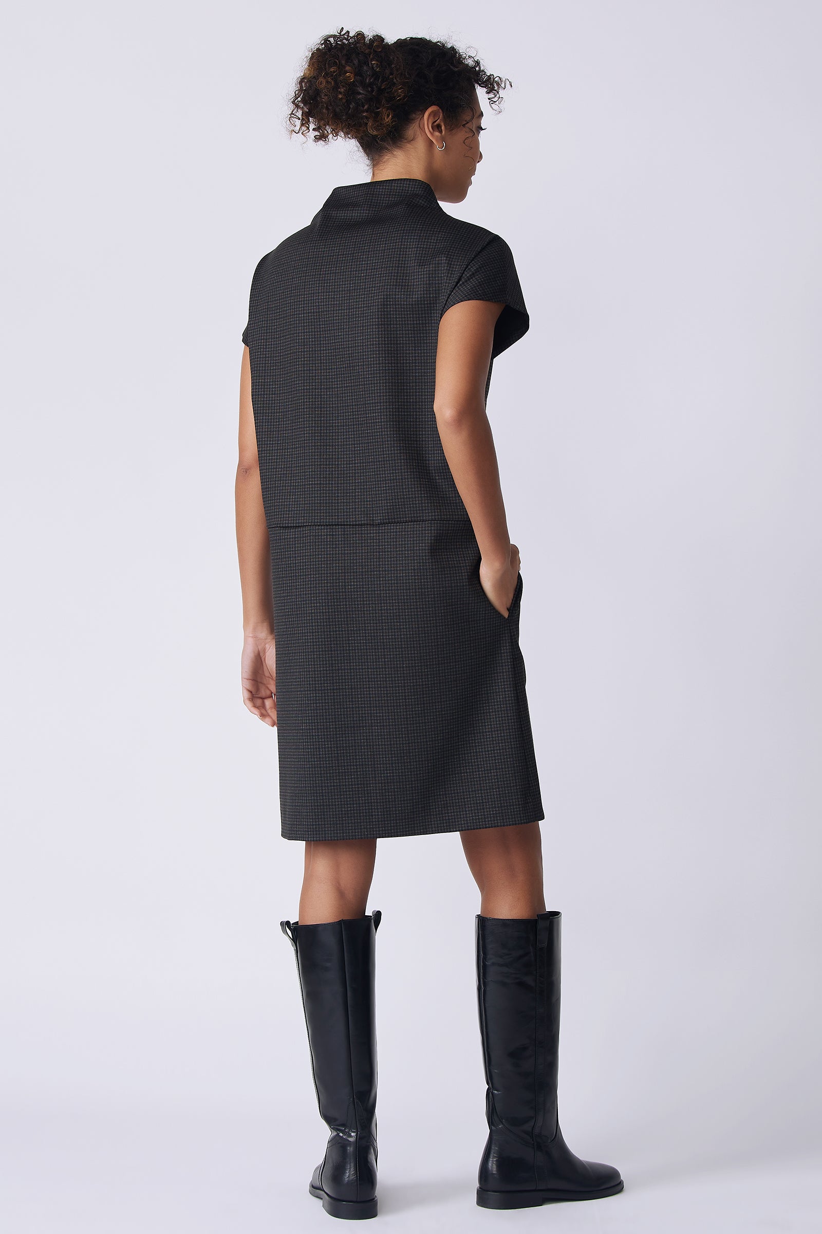 Kal Rieman Maya Funnelneck Dress in mini check ponte on model front view hand in pocket