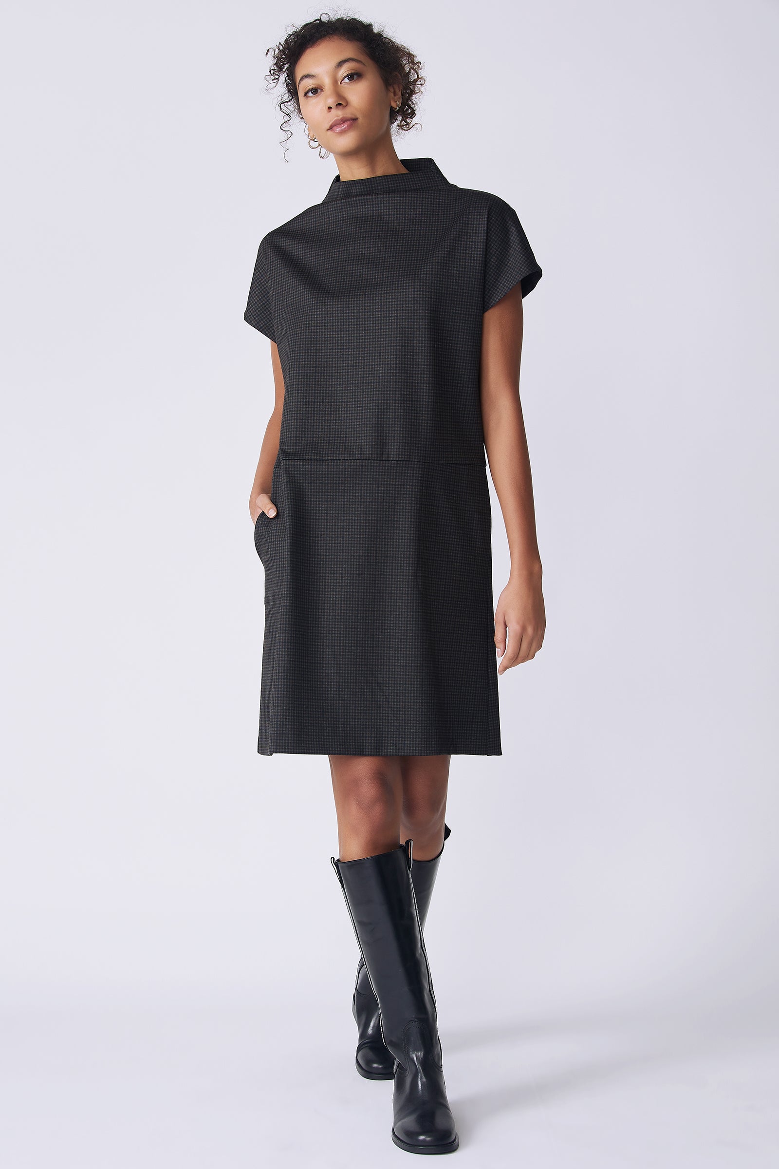 Kal Rieman Maya Funnelneck Dress in mini check ponte on model front view walking hand in pocket