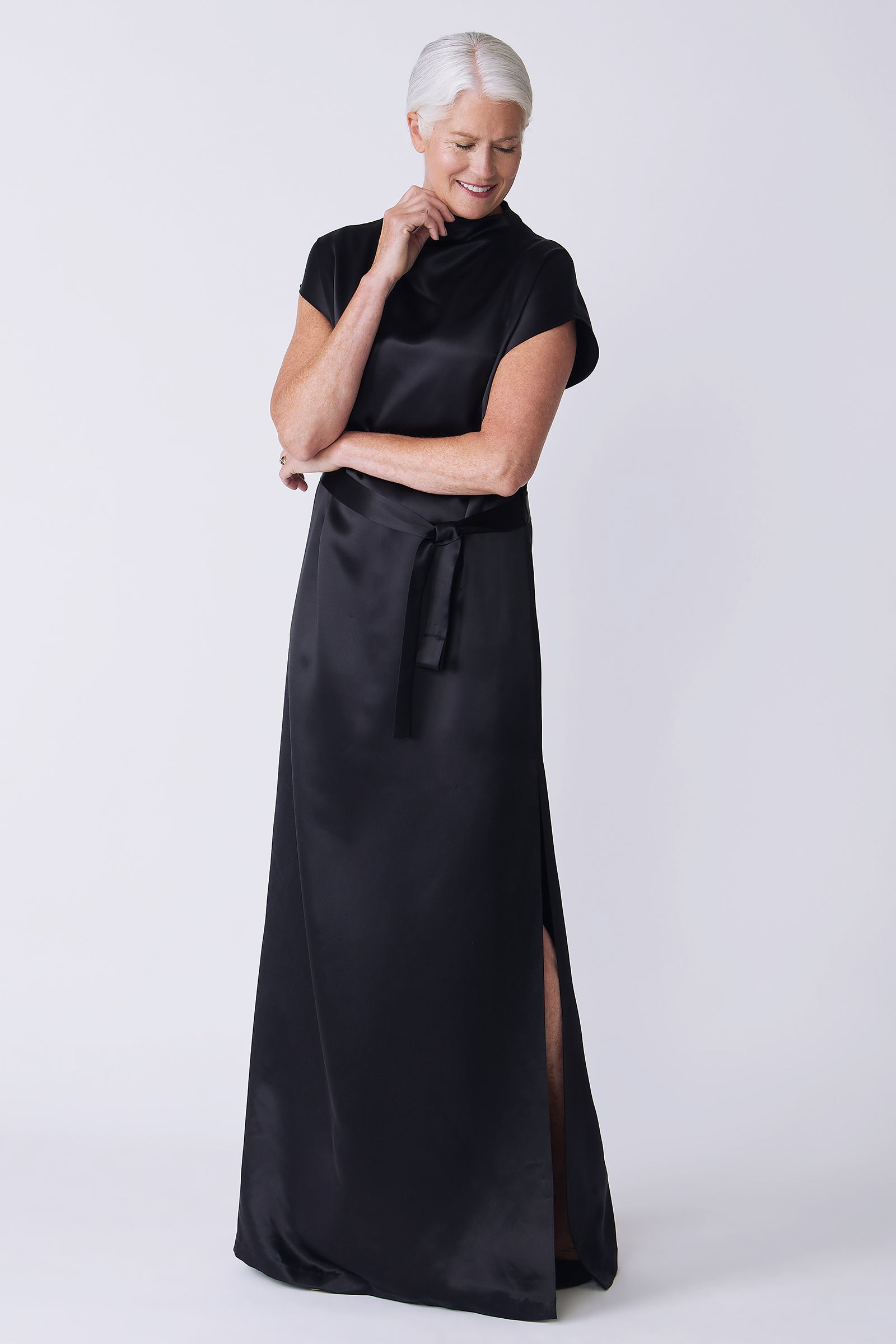 Kal Rieman Maya Gown in black on model side view looking down