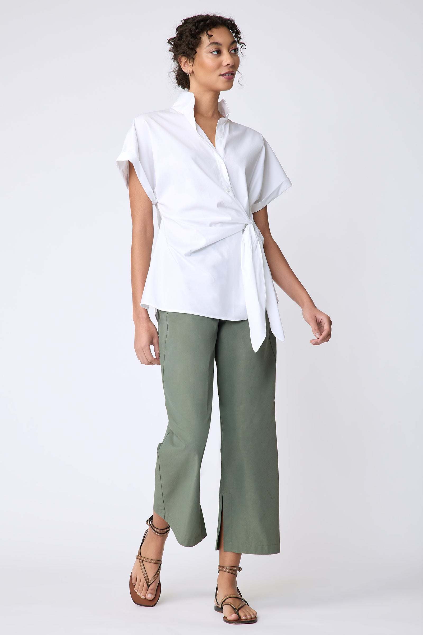 Kal Rieman Mila Wrap Top in white stretch cotton on model front view full look walking