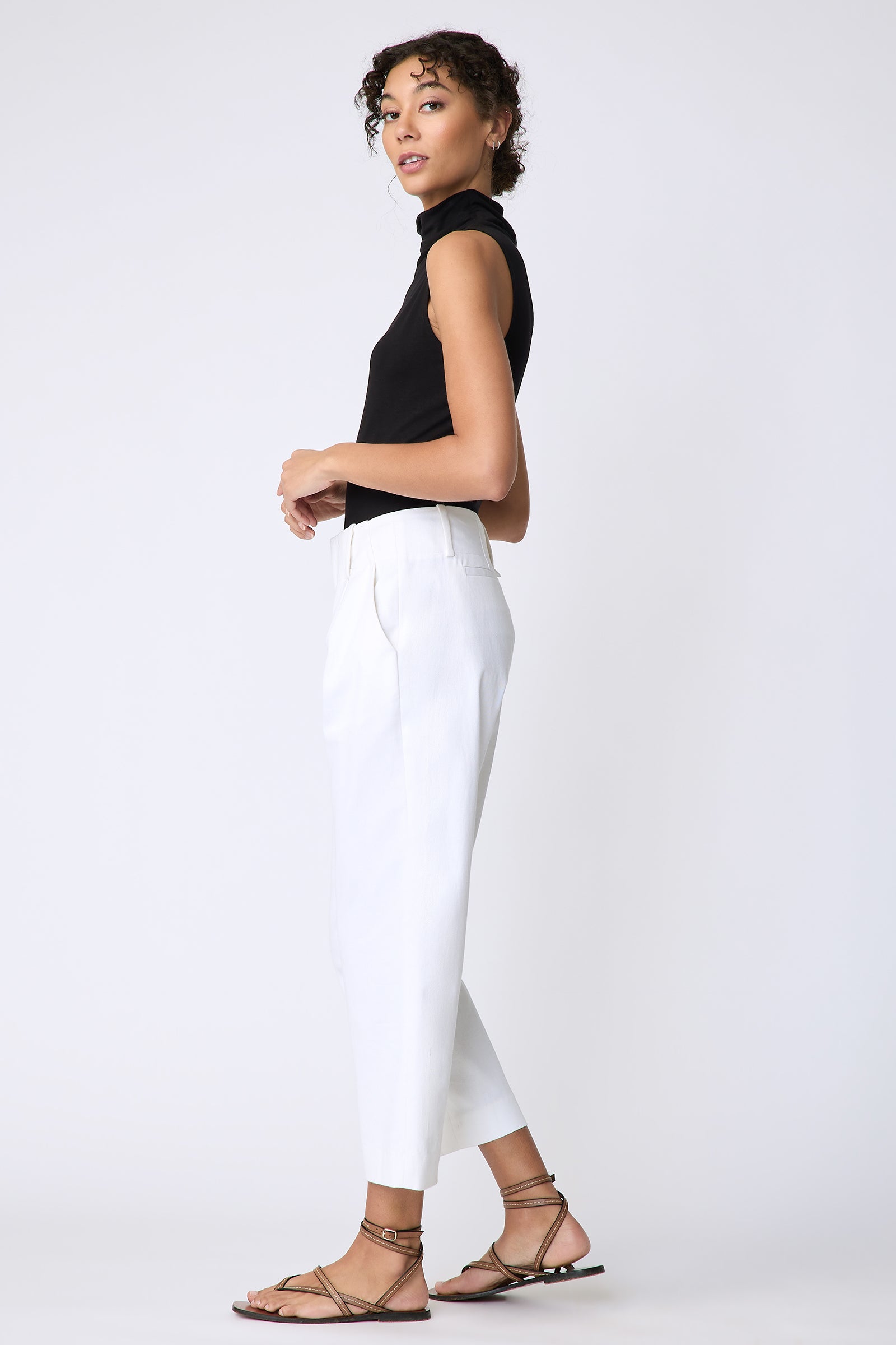 Kal Rieman Nolan Pant in Italian stretch twill on model side view walking