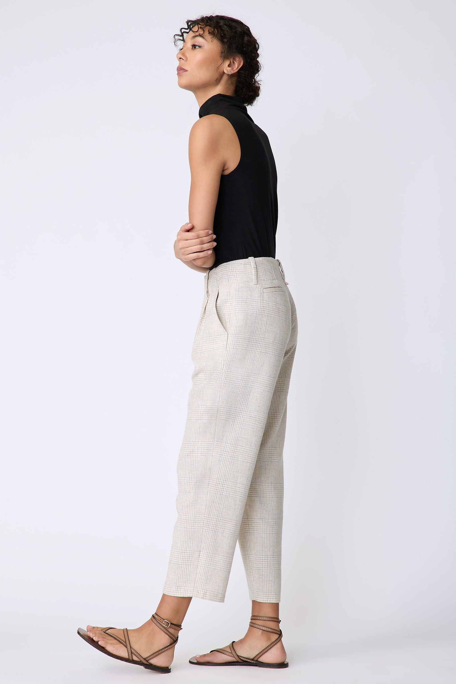 Kal Rieman Nolan Pant in Italian summer plaid on model side view arms in front