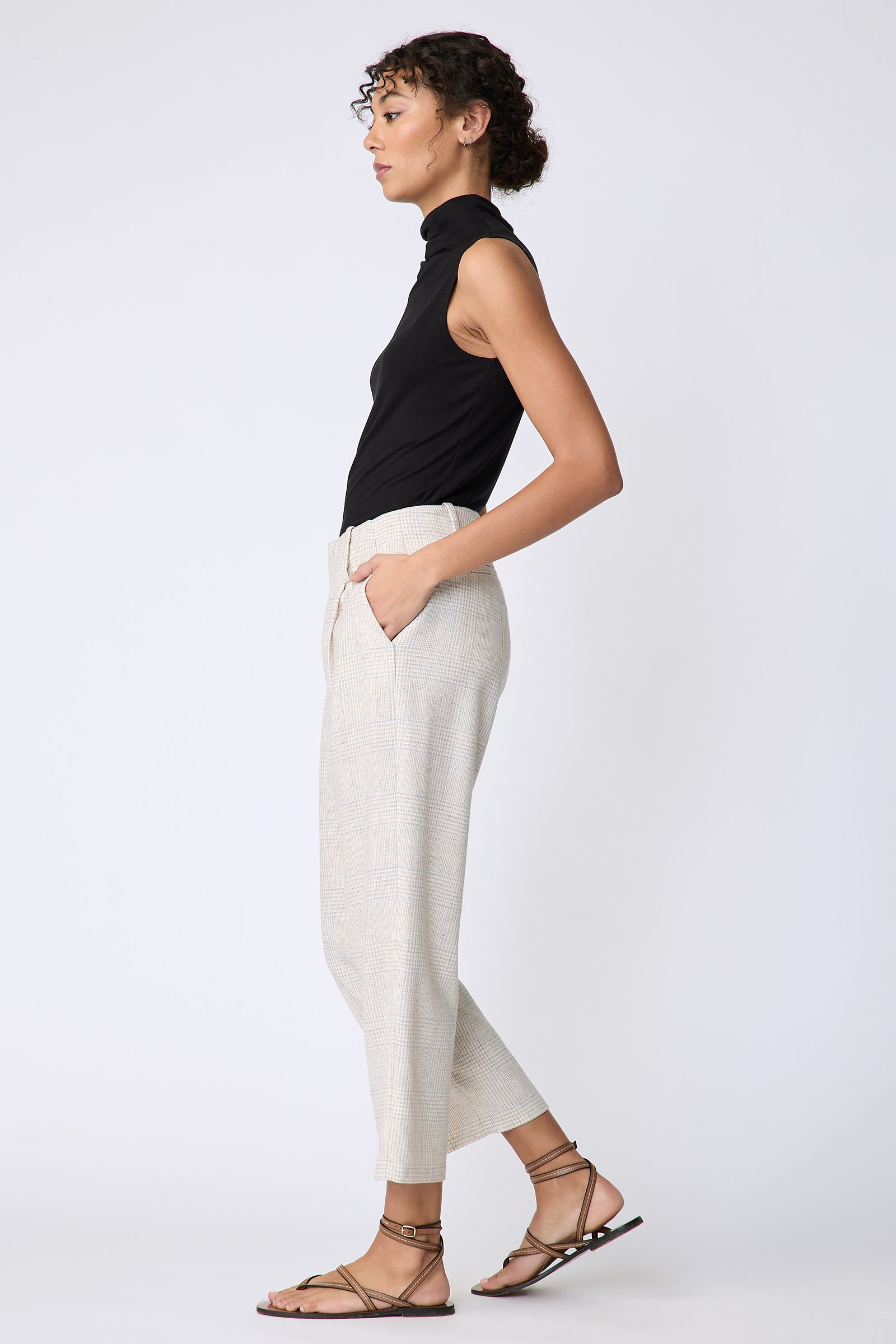 Kal Rieman Nolan Pant in Italian summer plaid on model side view hands in pockets