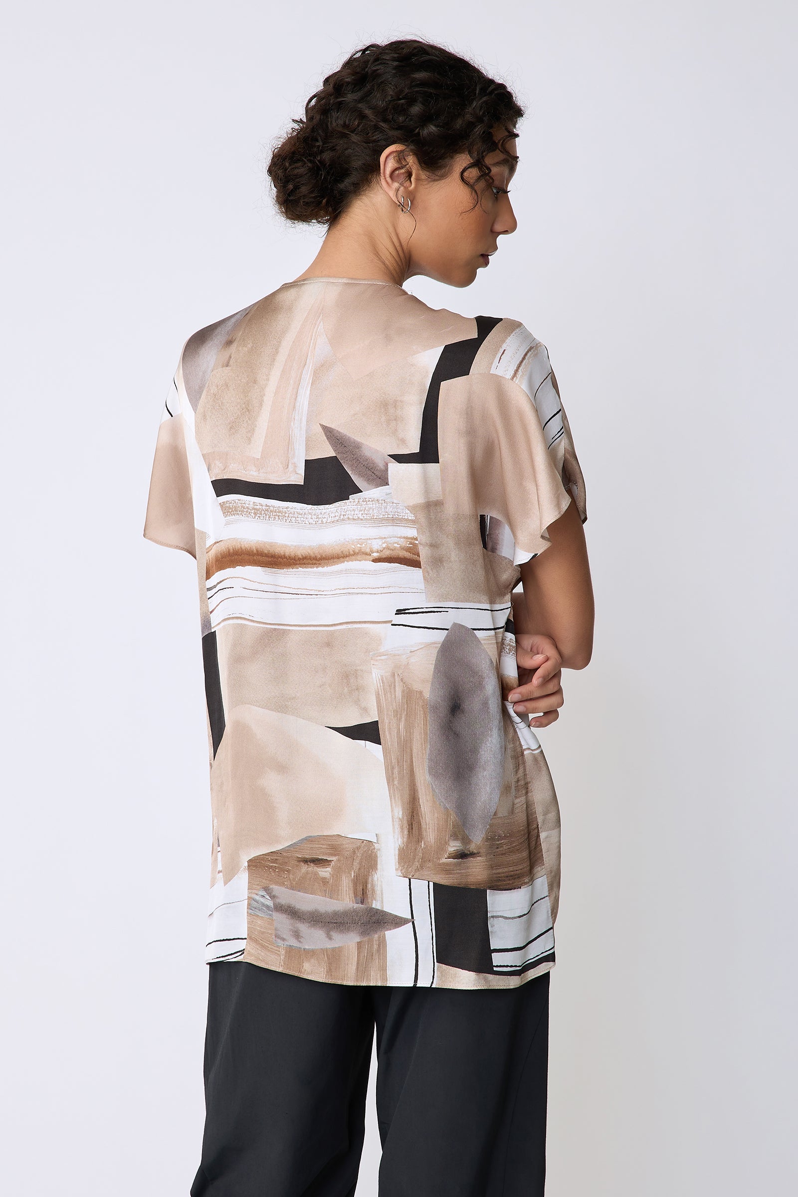 Kal Rieman Paloma Top in Sante Fe print Sand on model back view