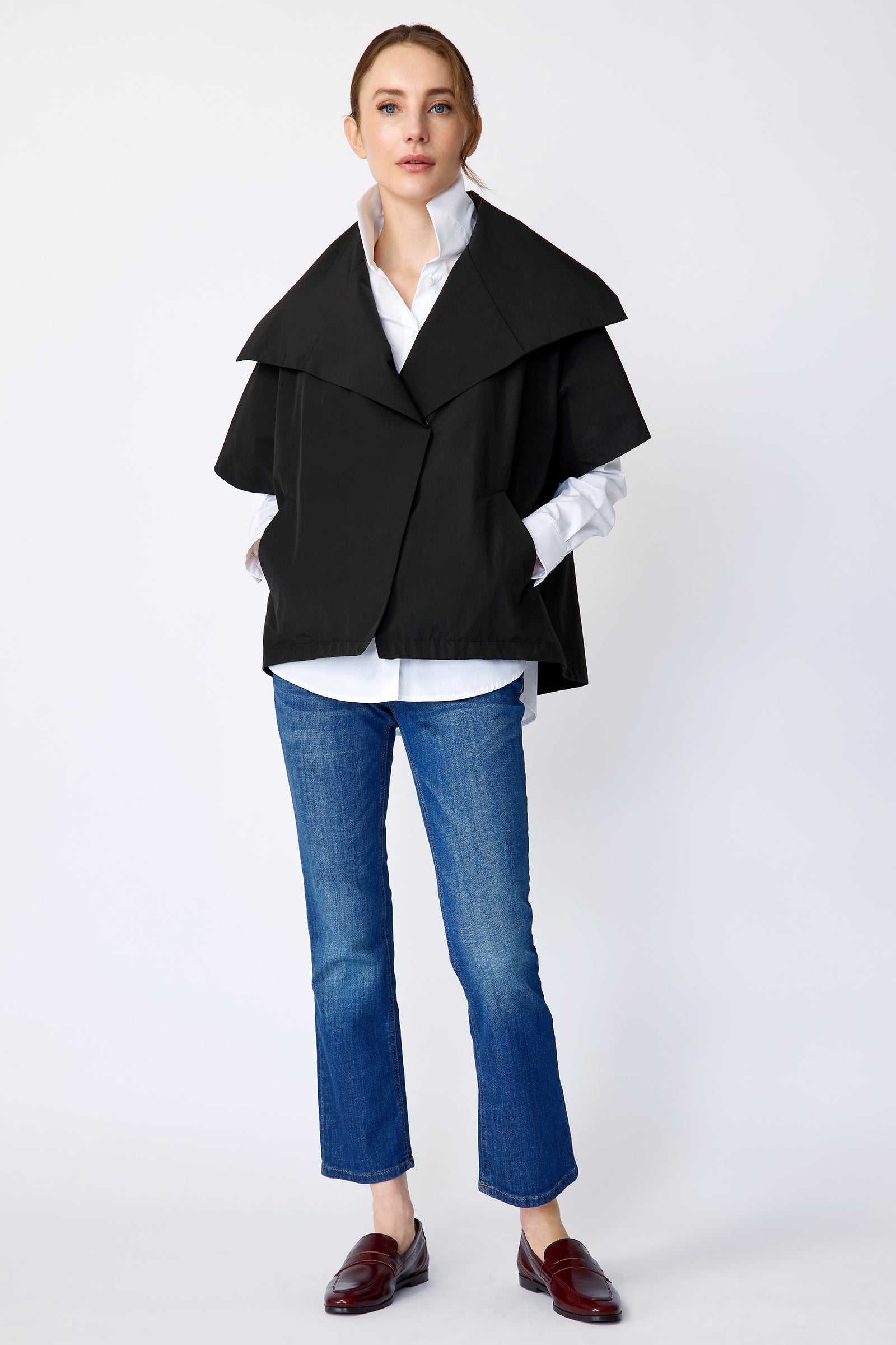 Kal Rieman Paris jacket in black Italian broadcloth on model front view full hands in pockets