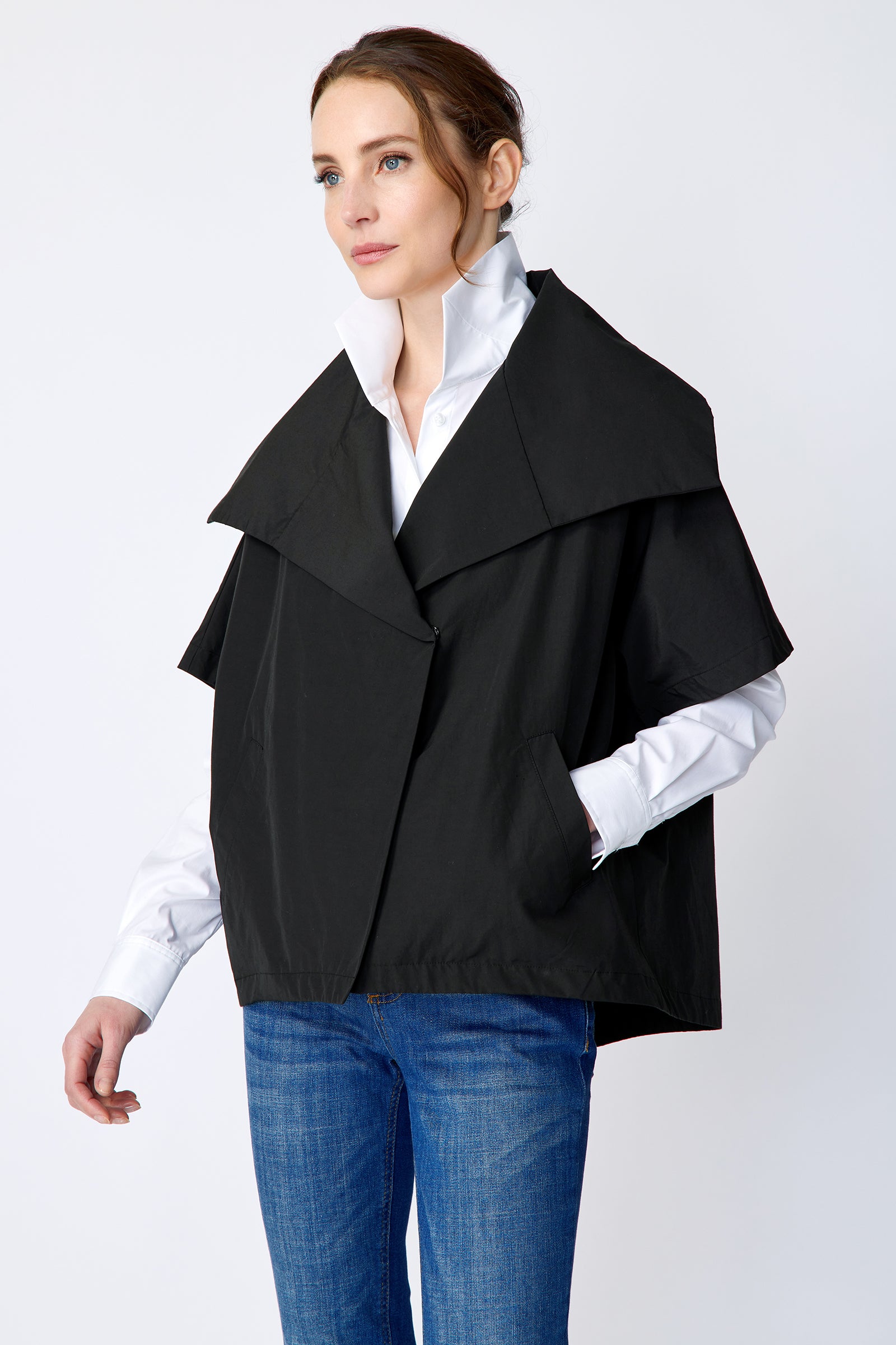 Kal Rieman Paris Jacket in black Italian Broadcloth on model side view hand in pocket