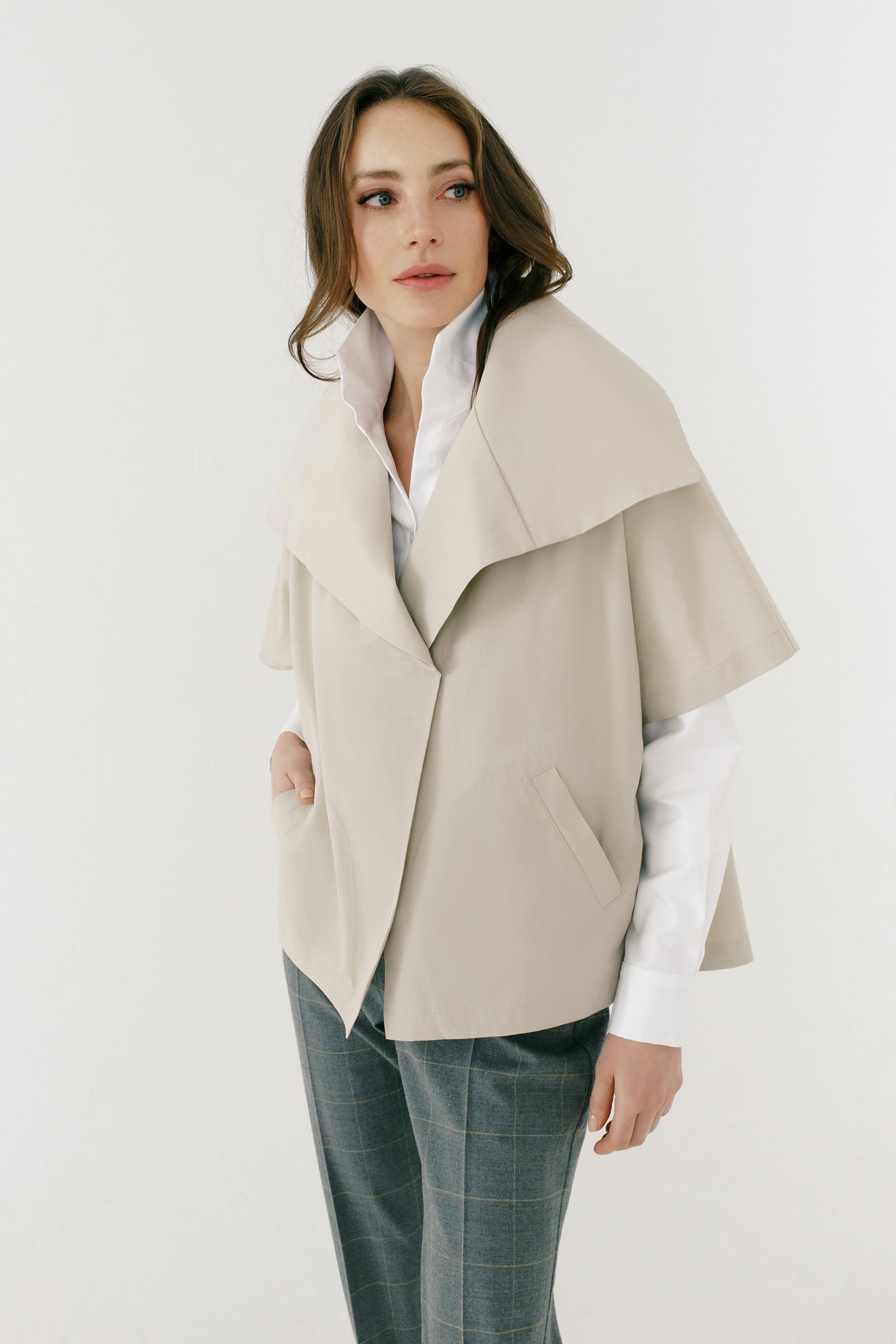 Kal Rieman Paris Jacket in Khaki Italian broadcloth on model three quarter view  hand in pocket