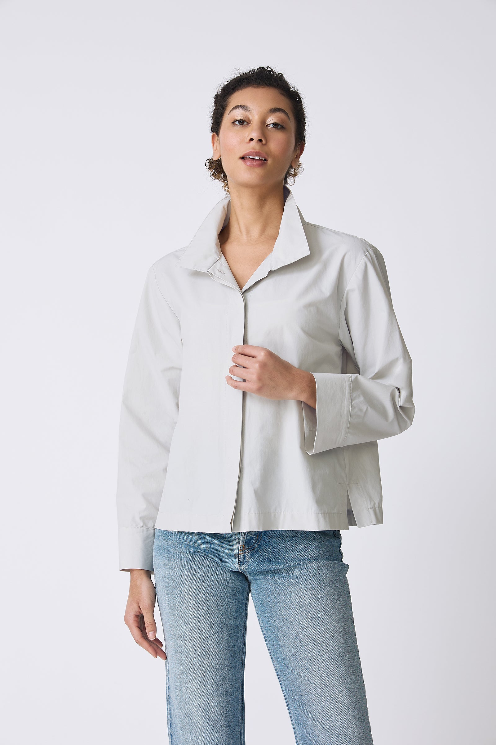 Kal Rieman Peggy Collared Shirt in Stone on model touching shirt front view
