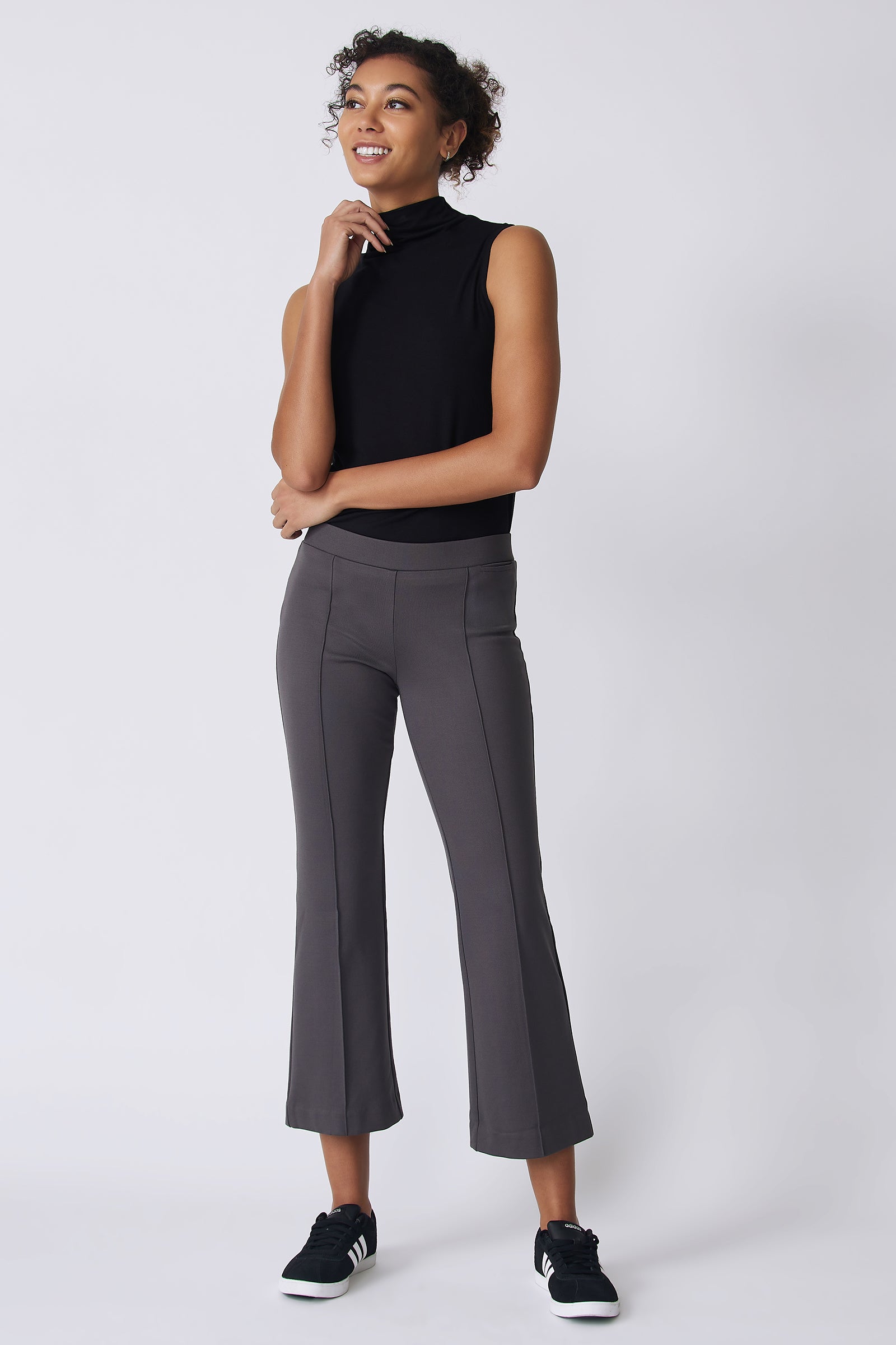 Kal Rieman Pintuck Crop Flare in charcoal ponte on model front view with hand on chin